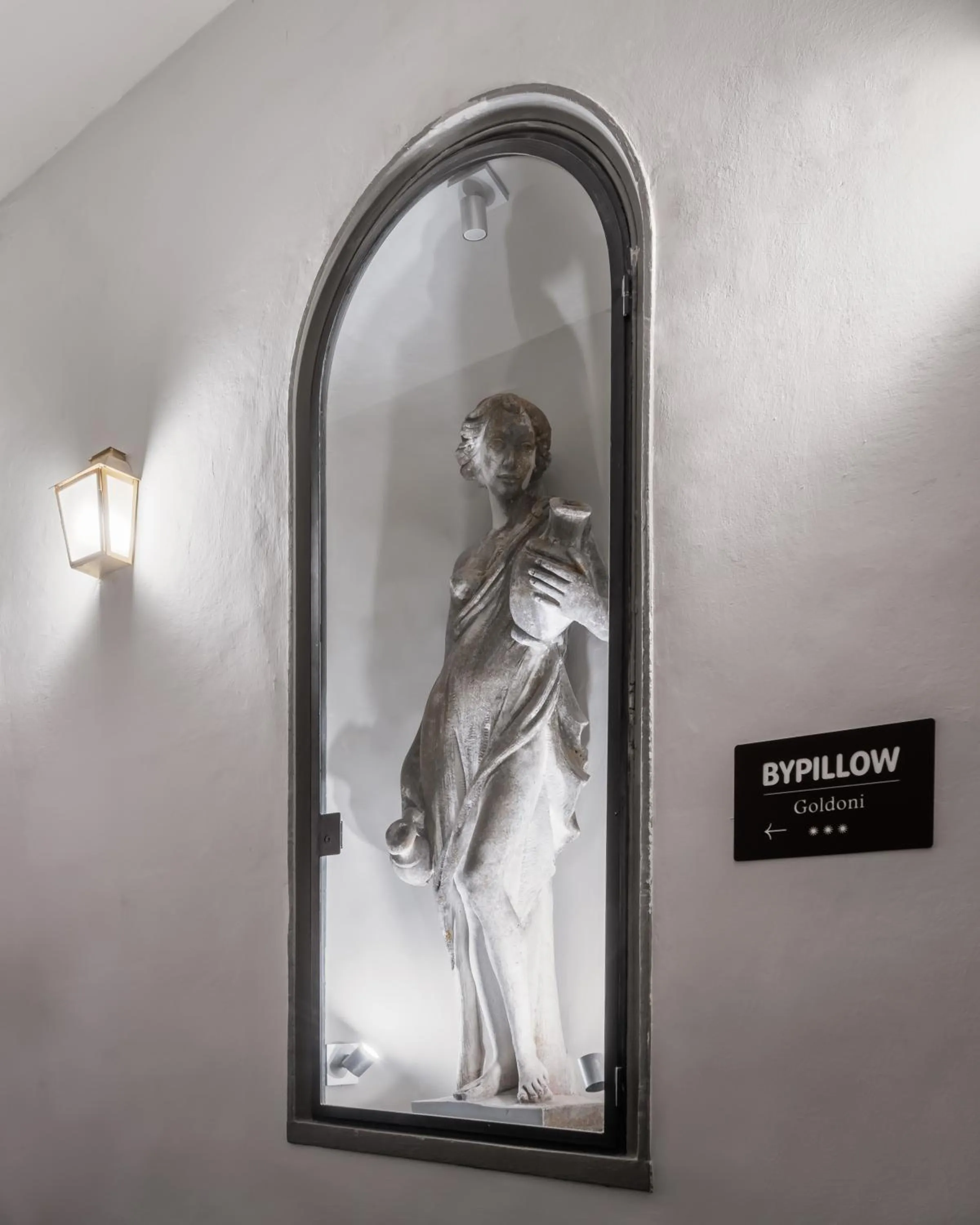 Property logo or sign in BYPILLOW Goldoni