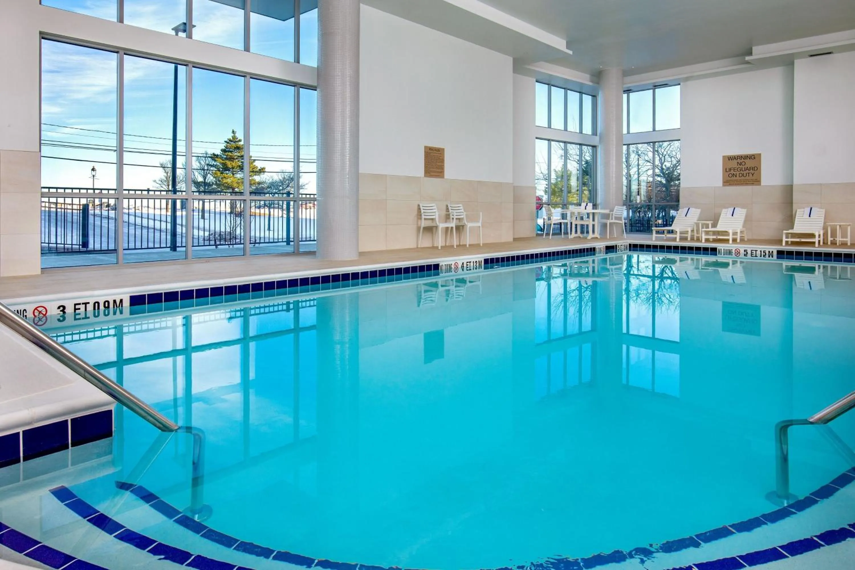 Swimming pool in SpringHill Suites by Marriott Boston Logan Airport Revere Beach