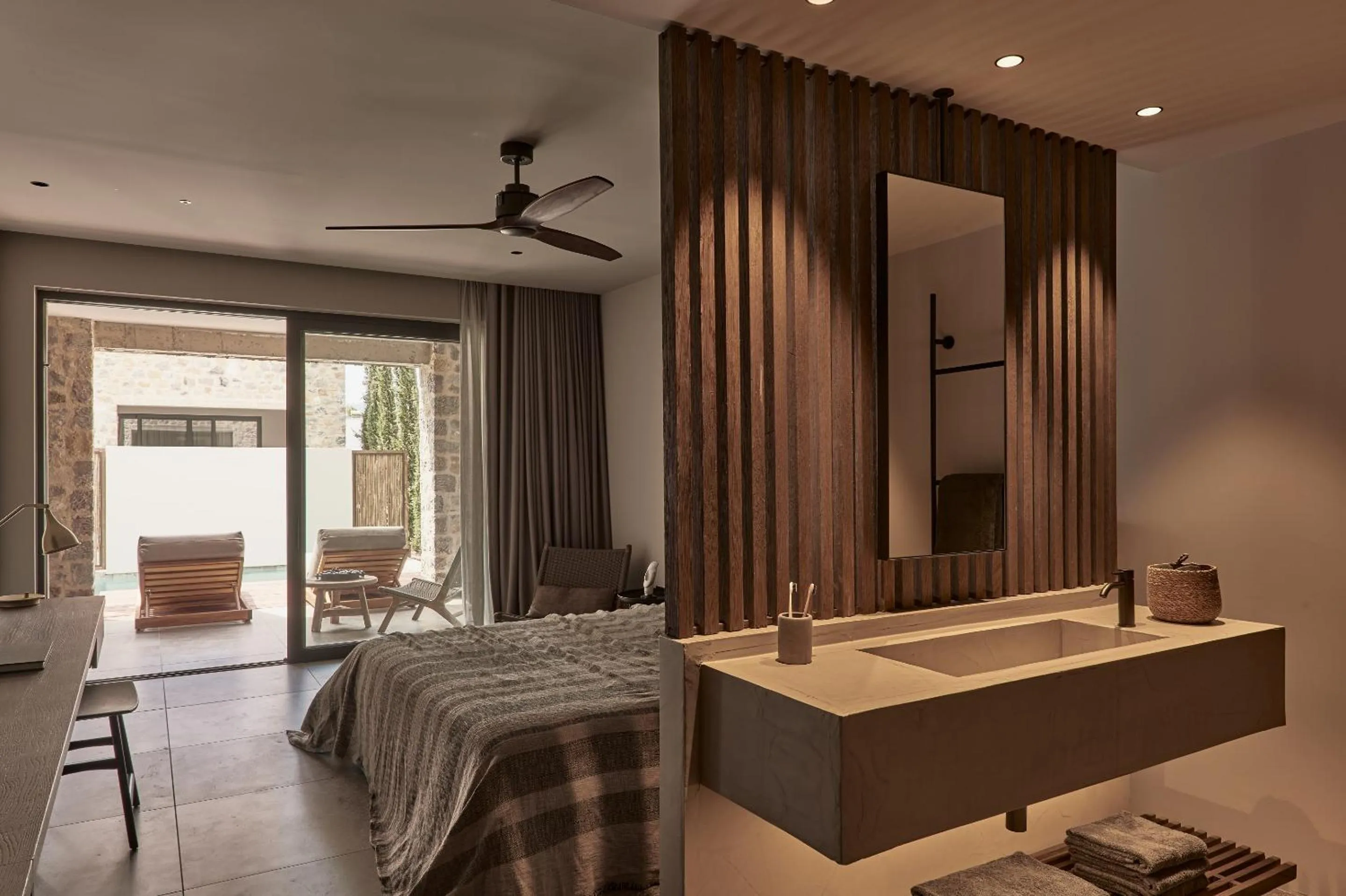 Bed in Theros All Suite Hotel - Adults Only