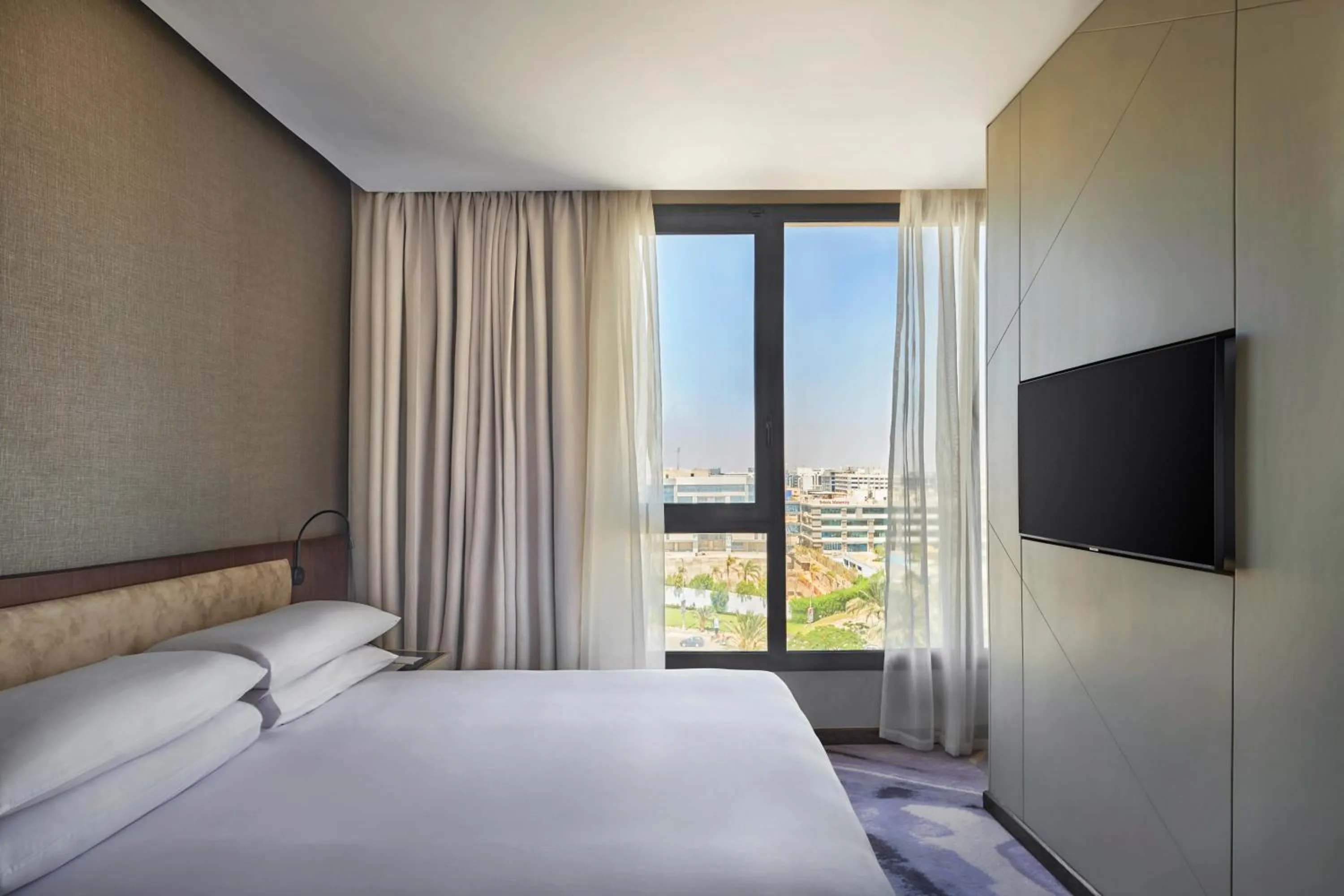 Bed in Crowne Plaza - West Cairo Arkan by IHG