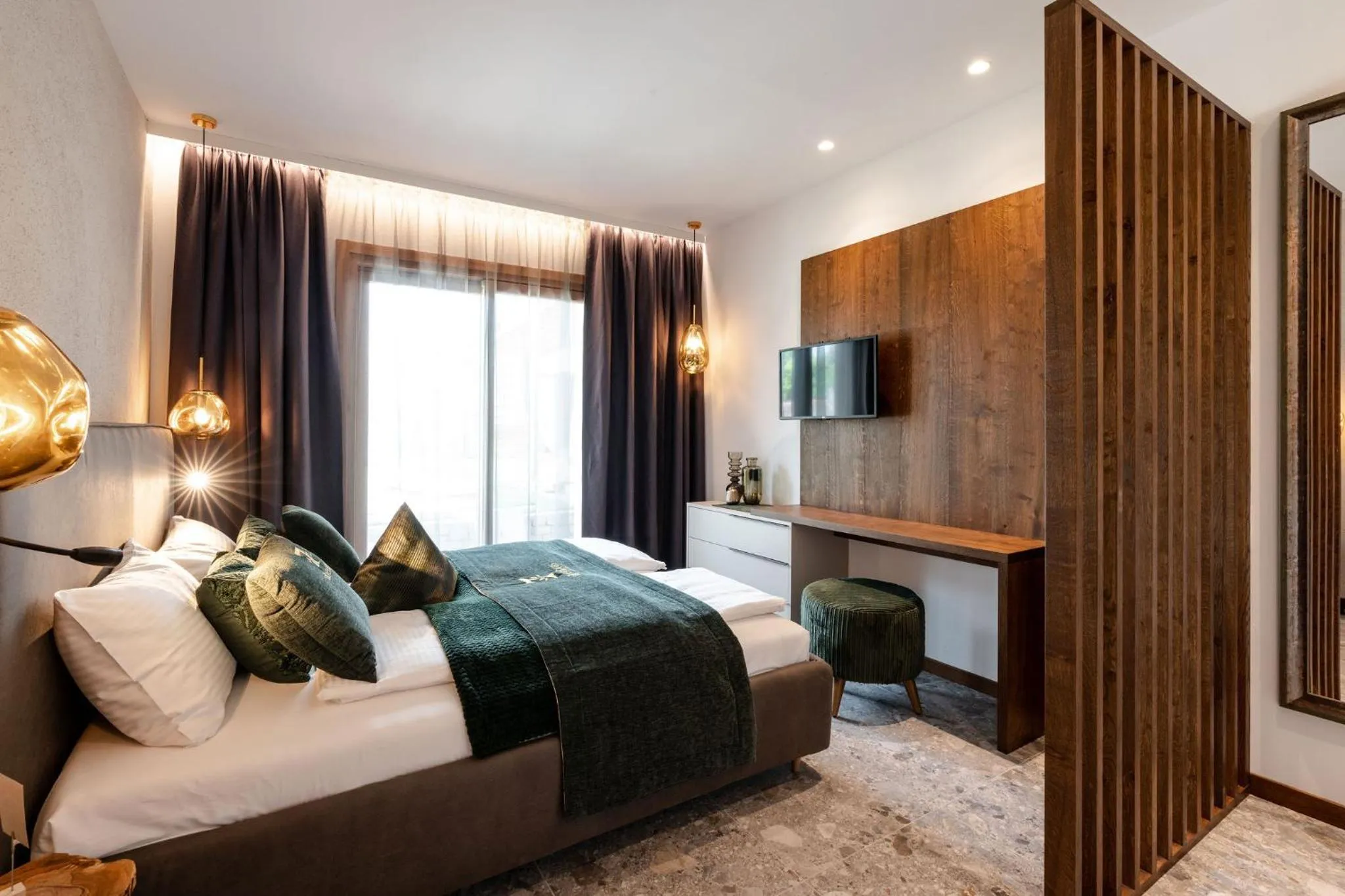 Bed in Sibenbras Natural Aparthotel