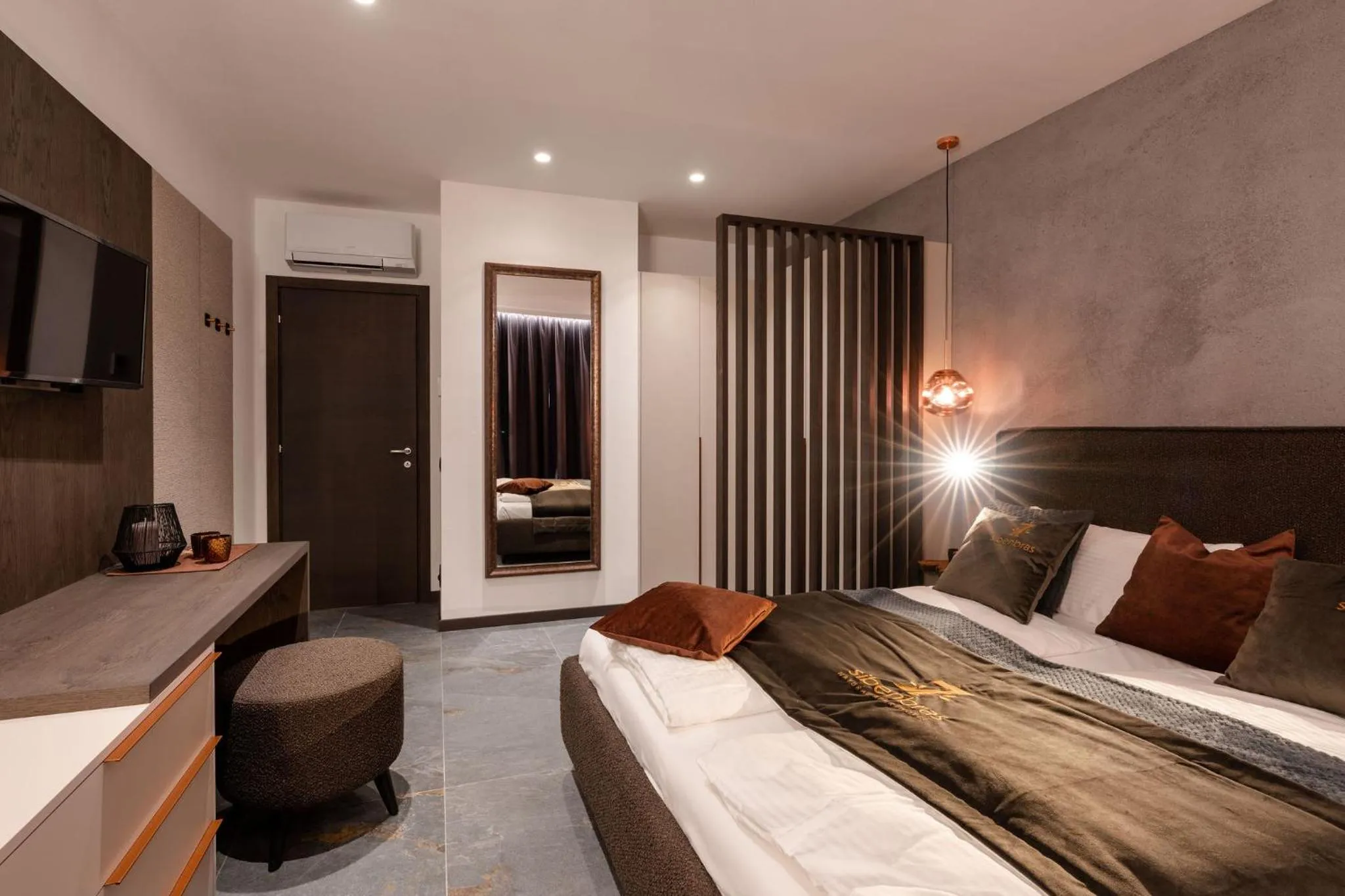 Bed in Sibenbras Natural Aparthotel