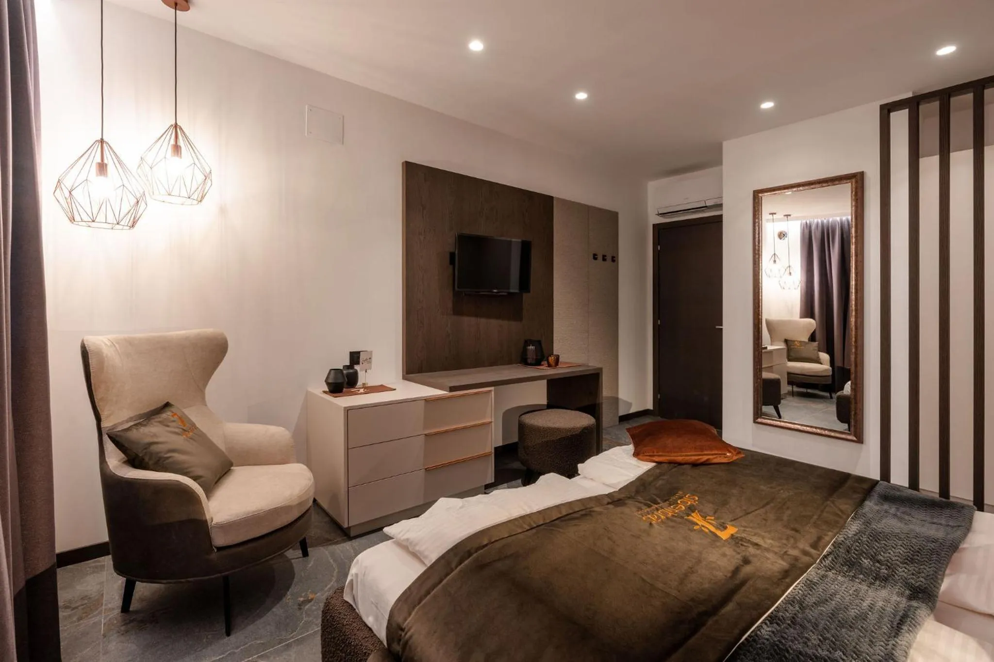 Bed in Sibenbras Natural Aparthotel