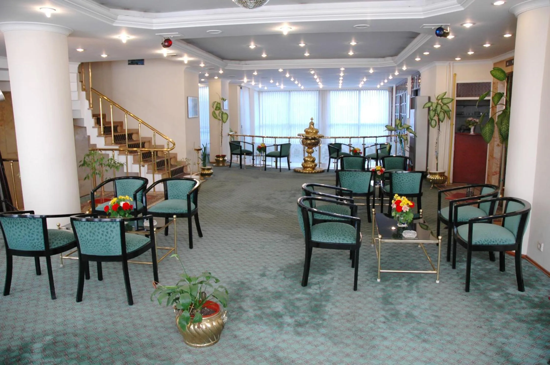 Communal lounge/ TV room in Avlonya Hotel