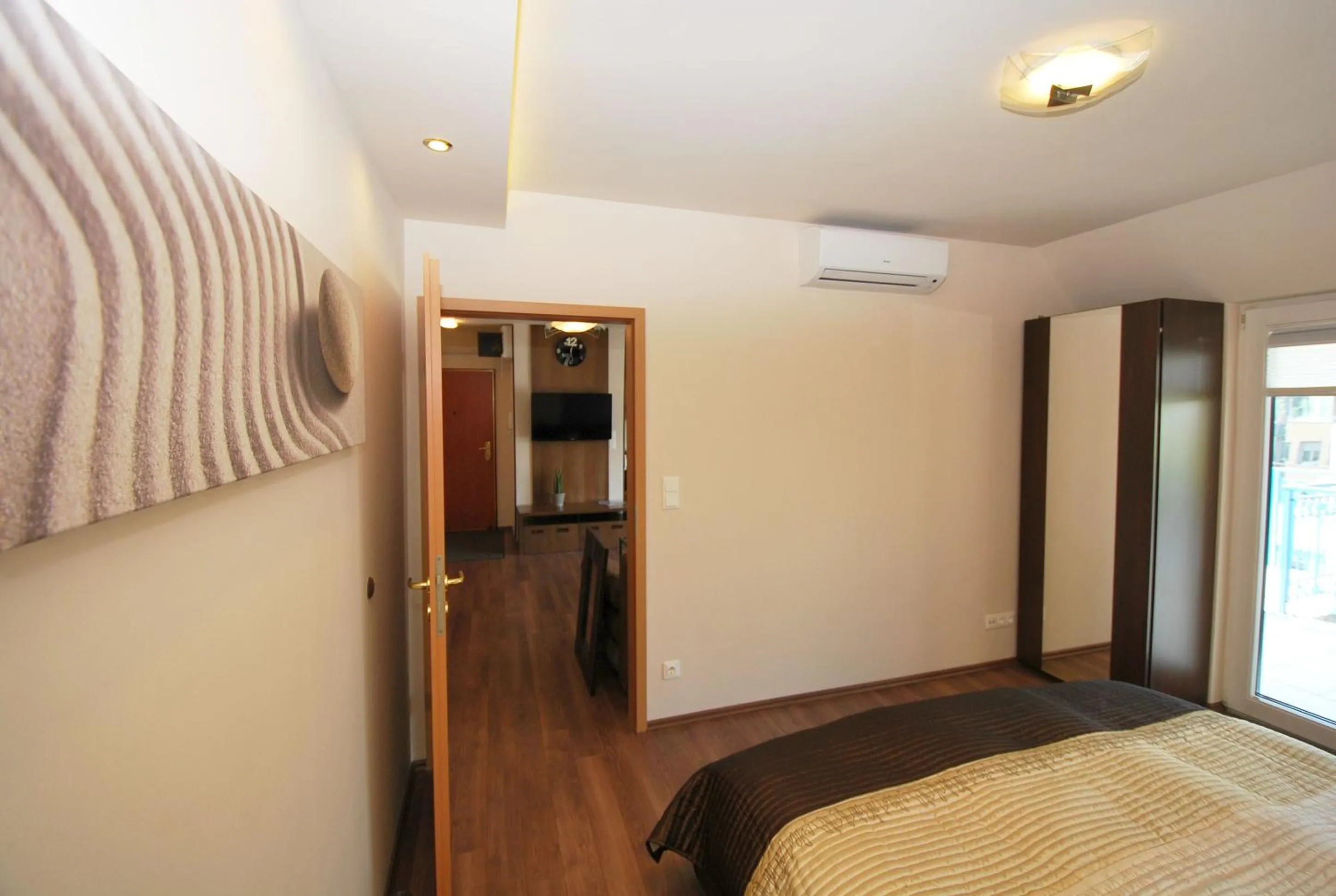 Bed in Arpad Bridge Apartments