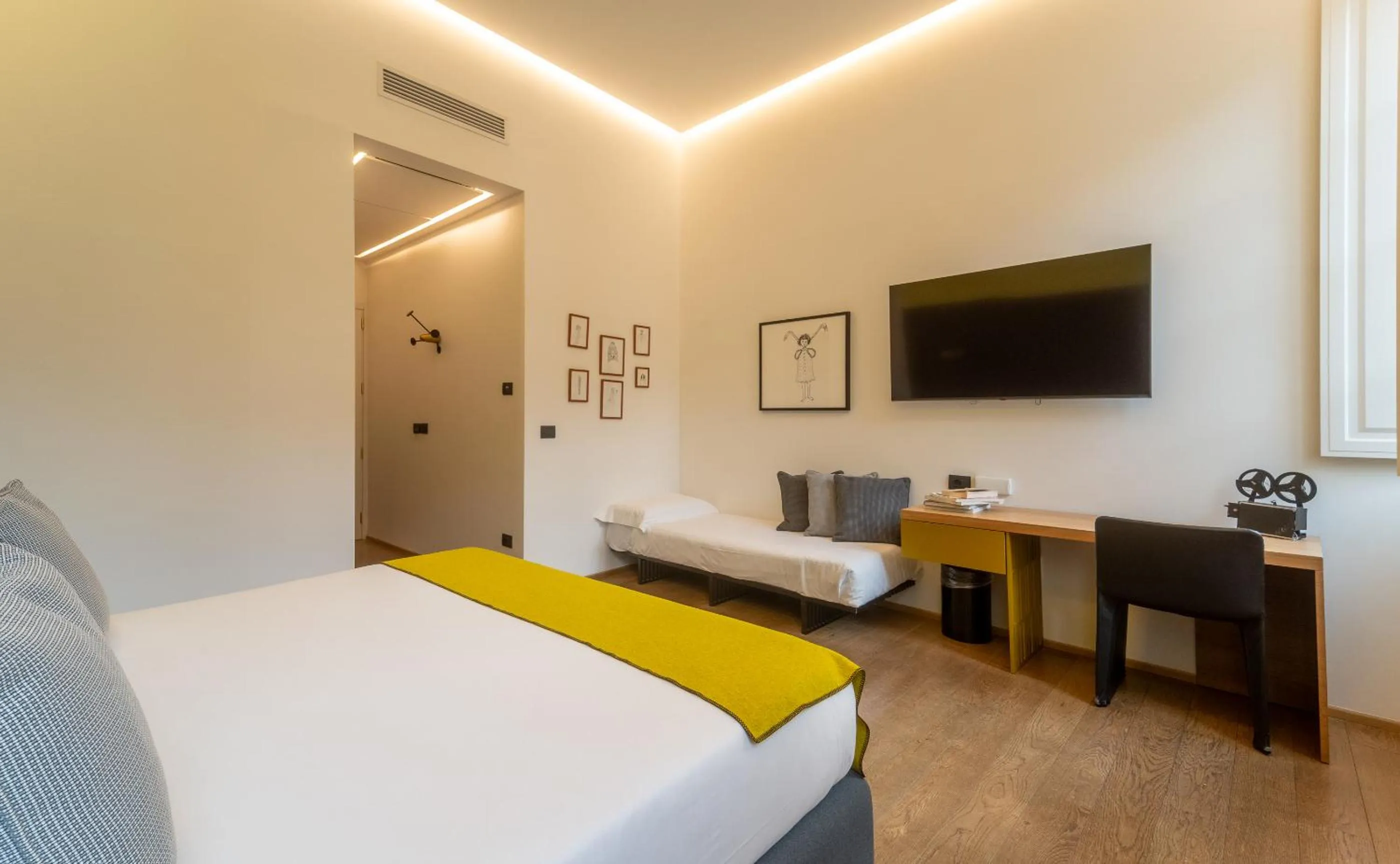 Seating area, Bed in Hotel Milu Florence