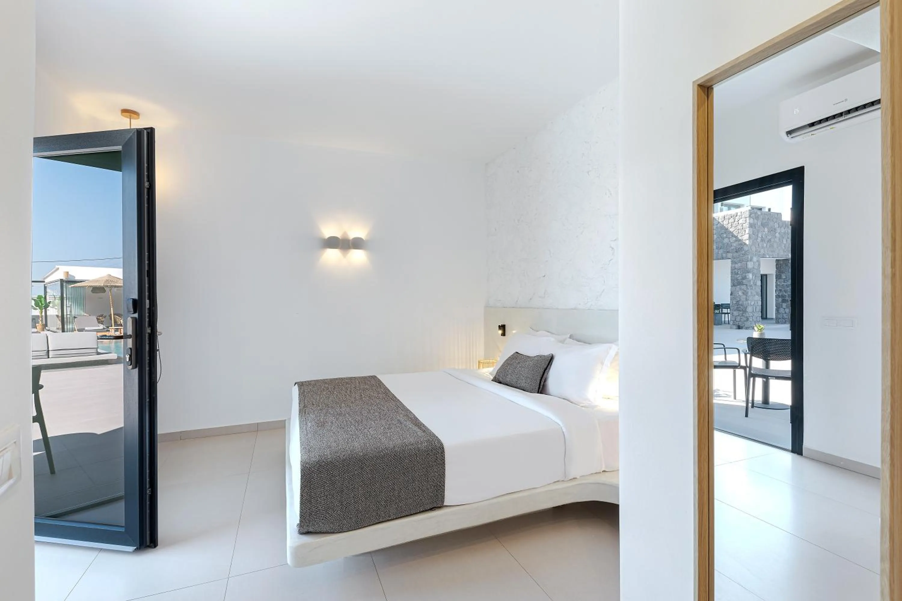 Bed in Onyx Hotel & Suites