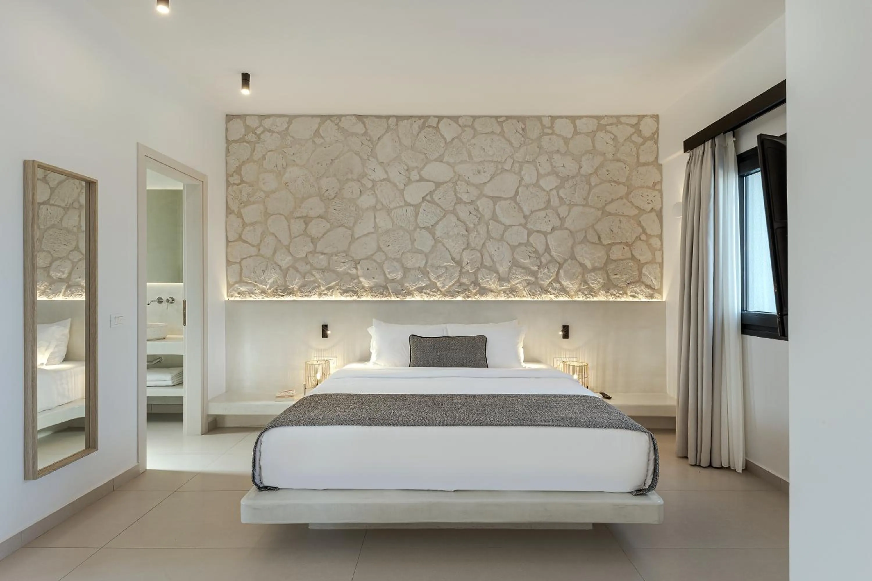 Bed in Onyx Hotel & Suites