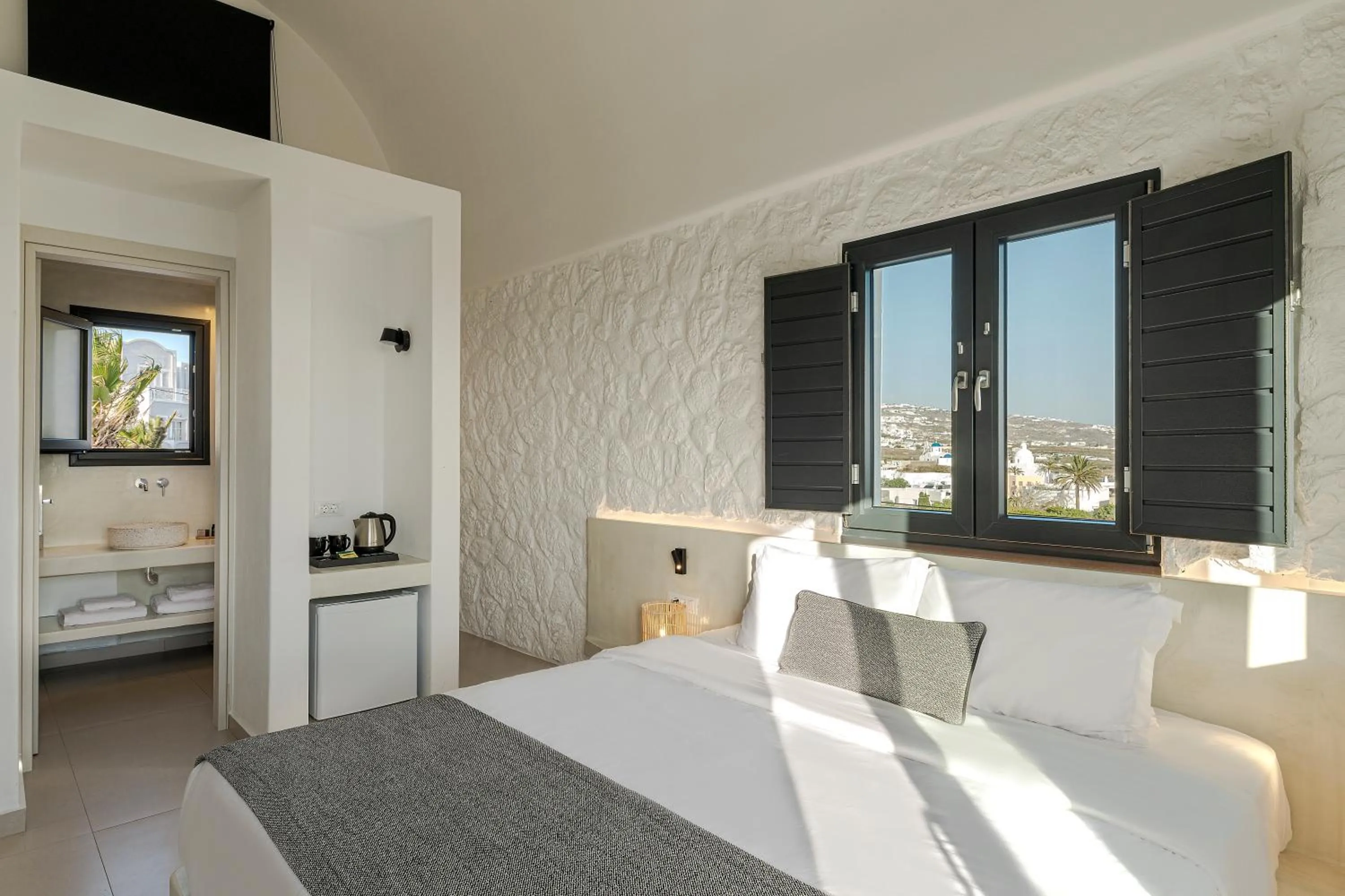 Bed in Onyx Hotel & Suites