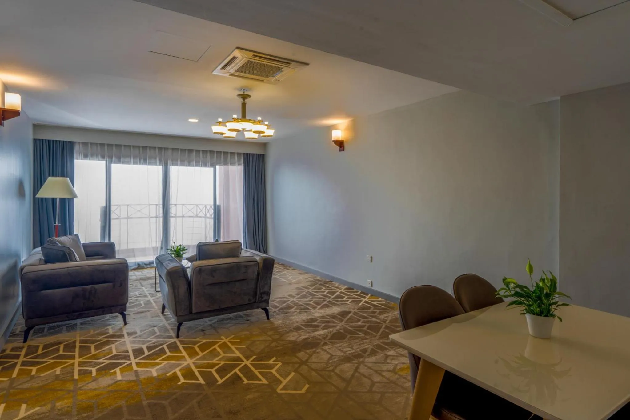 Seating area in Manhattan Business Hotel, Male