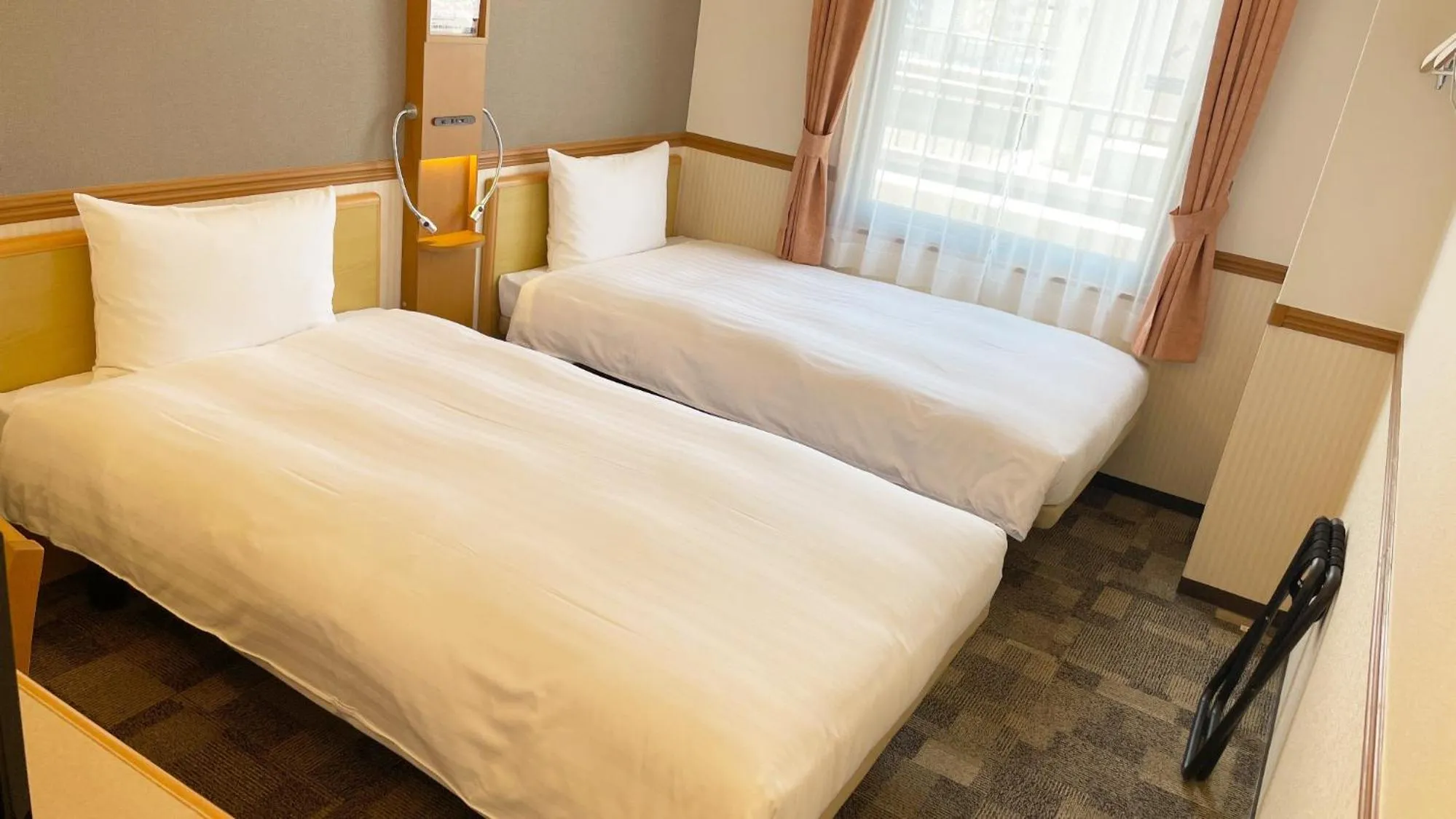 Bedroom, Bed in Toyoko Inn Kagoshima Temmonkan No 2