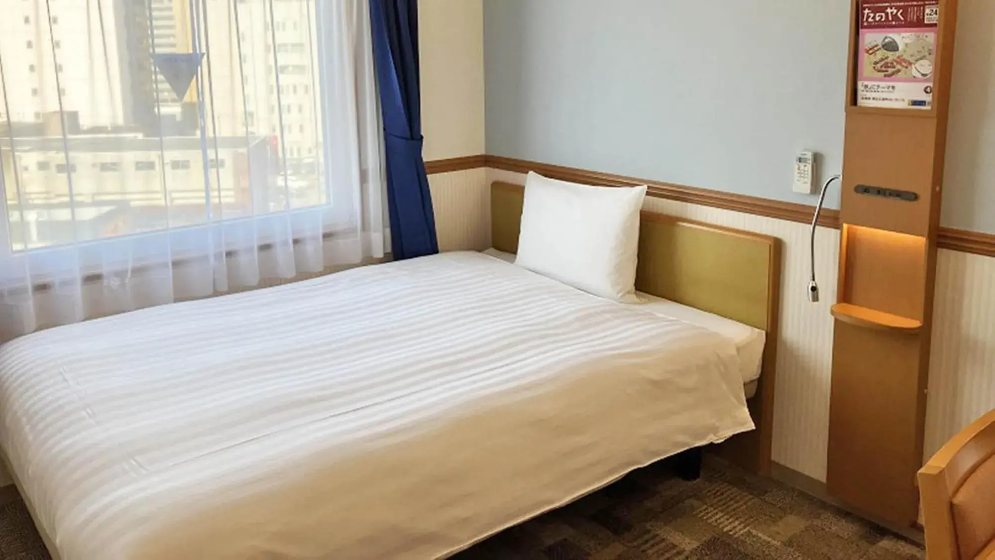 Bed in Toyoko Inn Toyama eki Shinkansen guchi No 1 Bed in Toyoko Inn Toyama eki Shinkansen guchi No 1