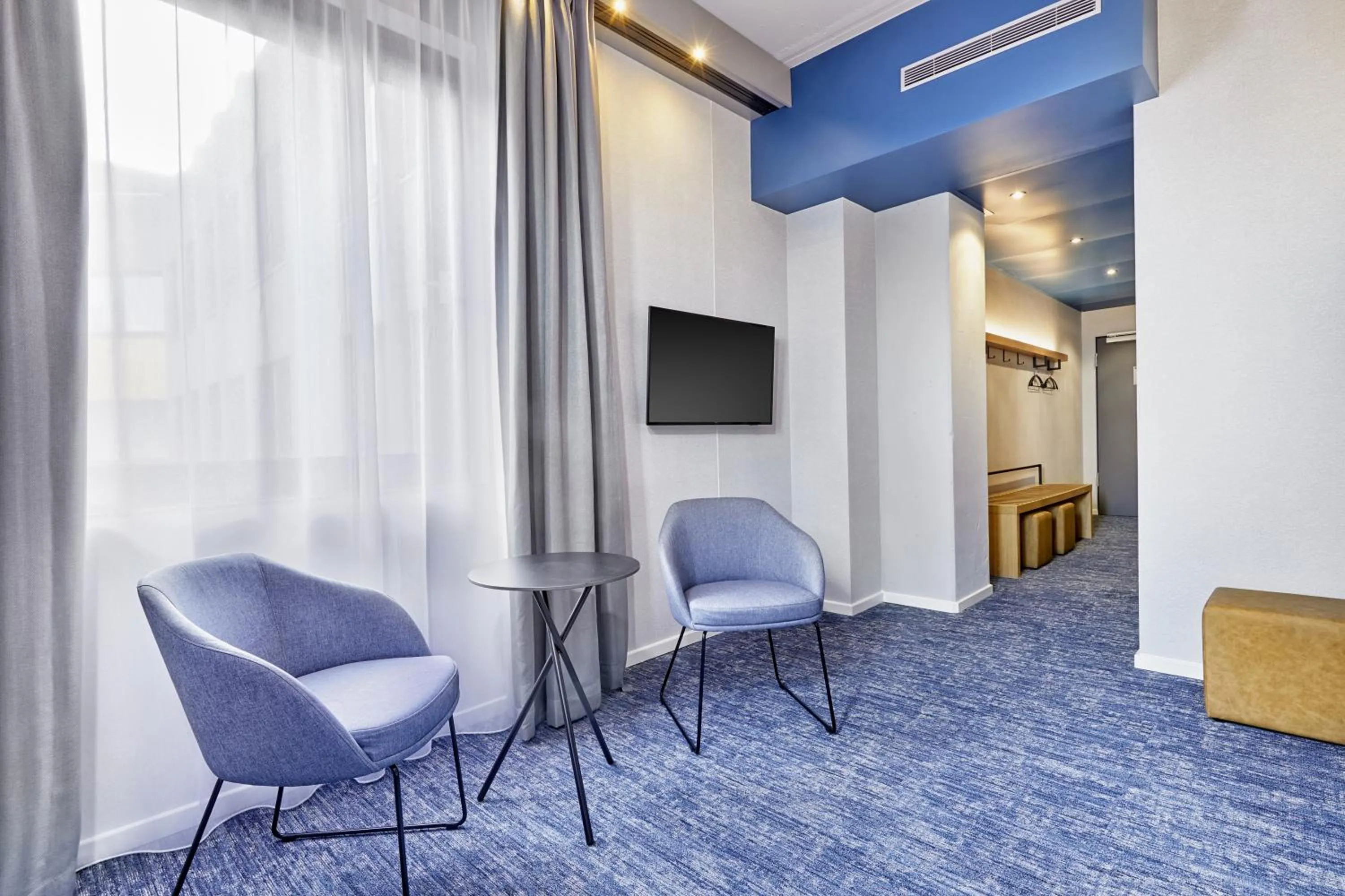 Living room in H2 Hotel Düsseldorf Seestern