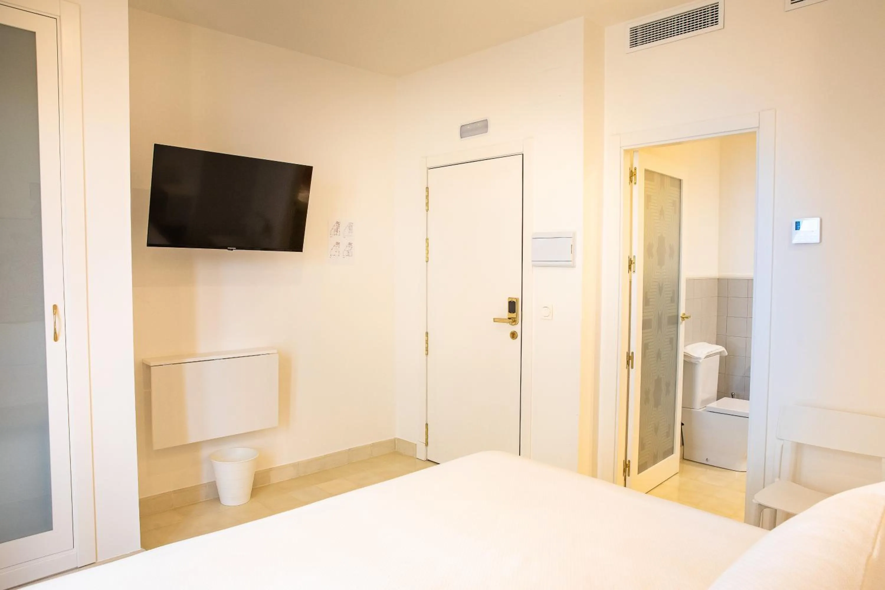 Photo of the whole room, Bed in Posada Boutique El Gallo Morón