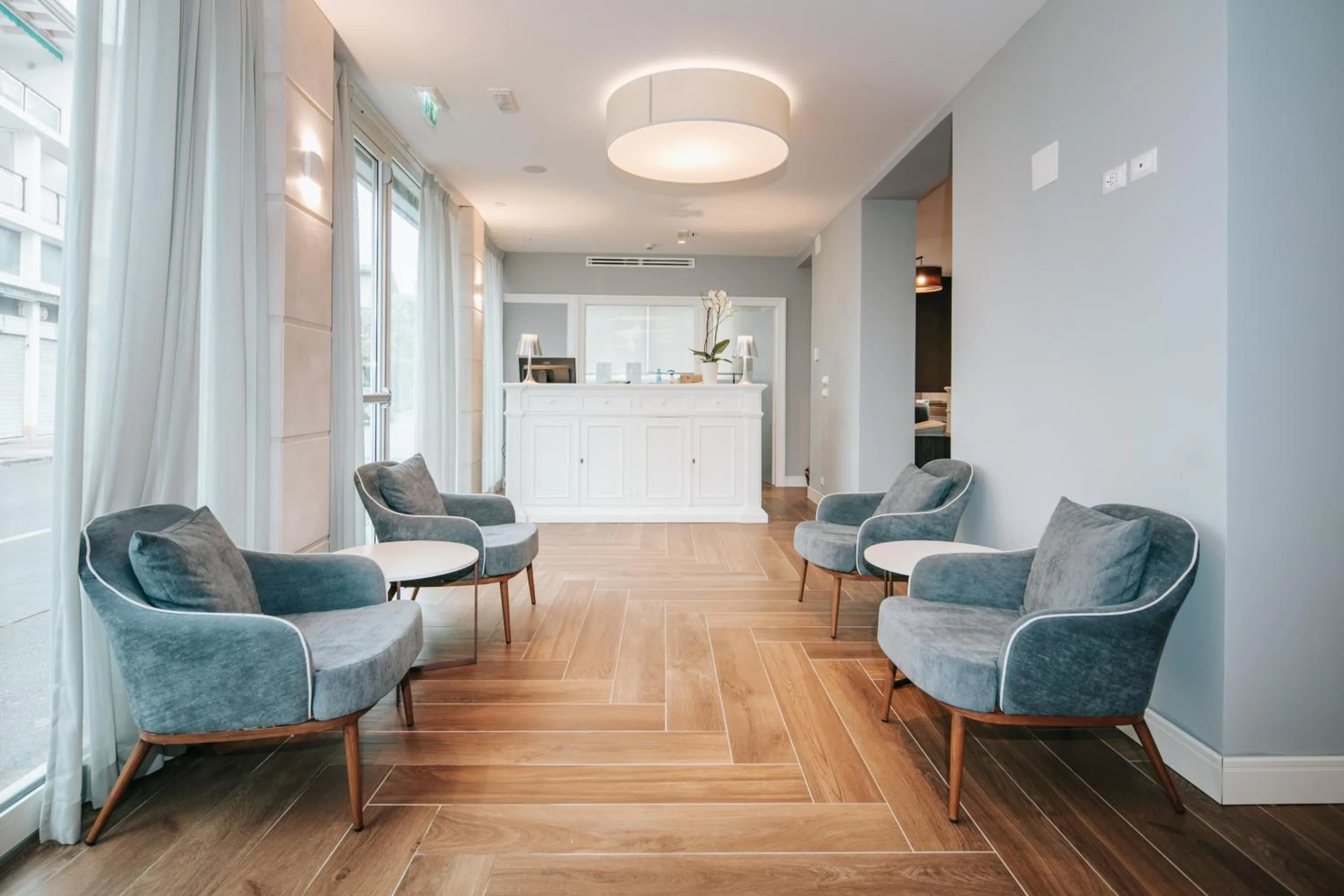 Communal lounge/ TV room in Aparthotel Touring