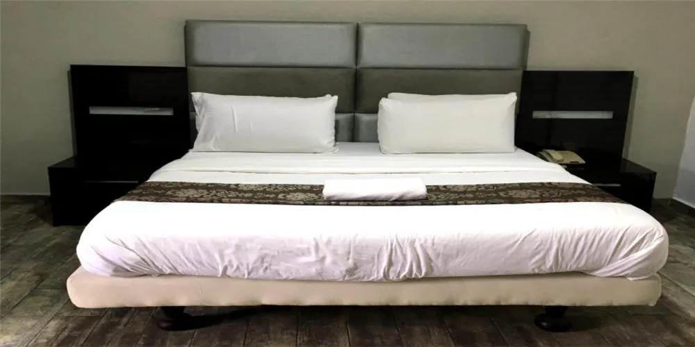 Bed in Ellyxville Hotel