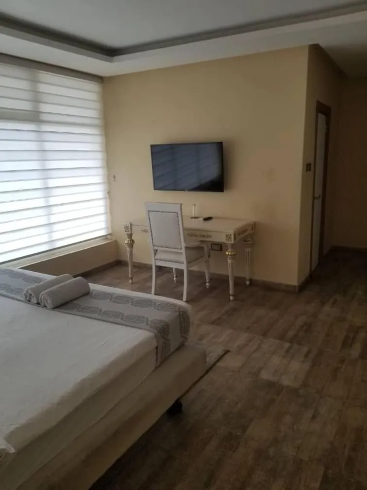 Bed in Ellyxville Hotel