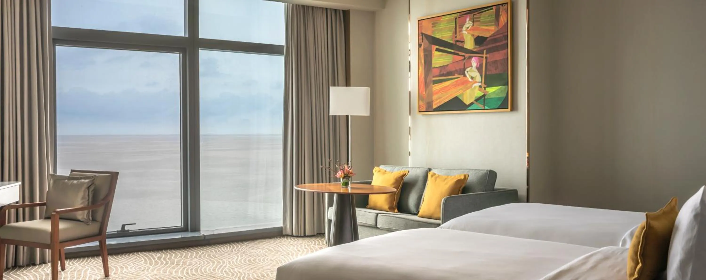 Bed in Fili Hotel at Nustar Cebu