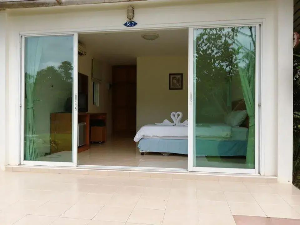 Bed in Vimannam Resort Bed in Vimannam Resort