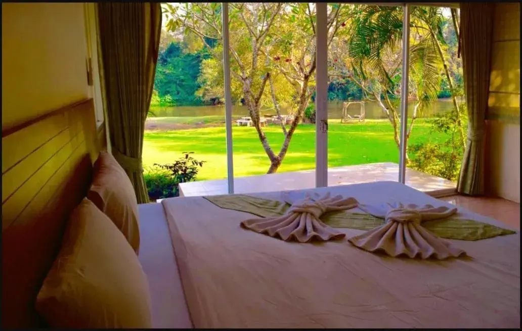 Bed in Vimannam Resort Bed in Vimannam Resort