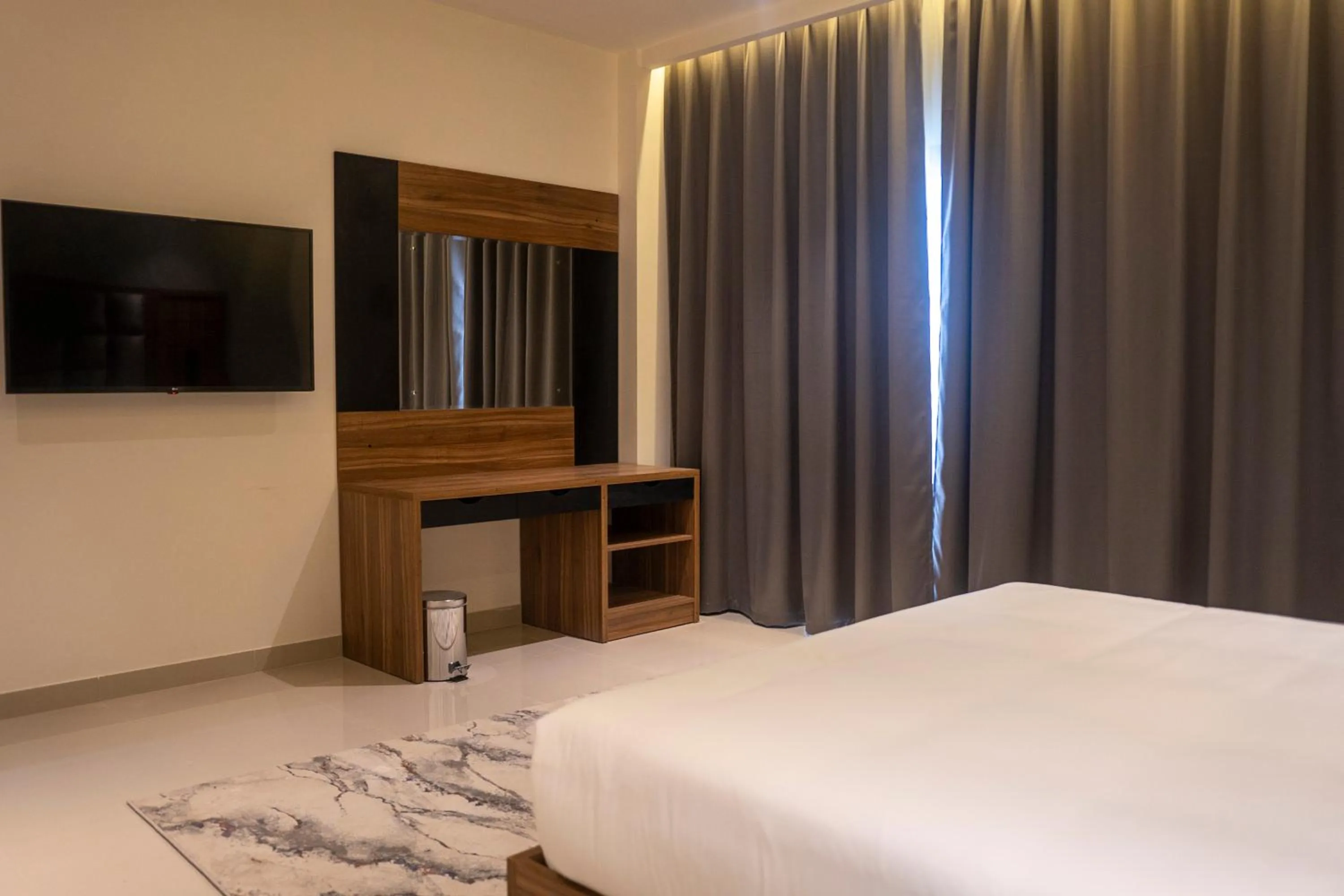 Bed in The Plaza Hotel & Resort