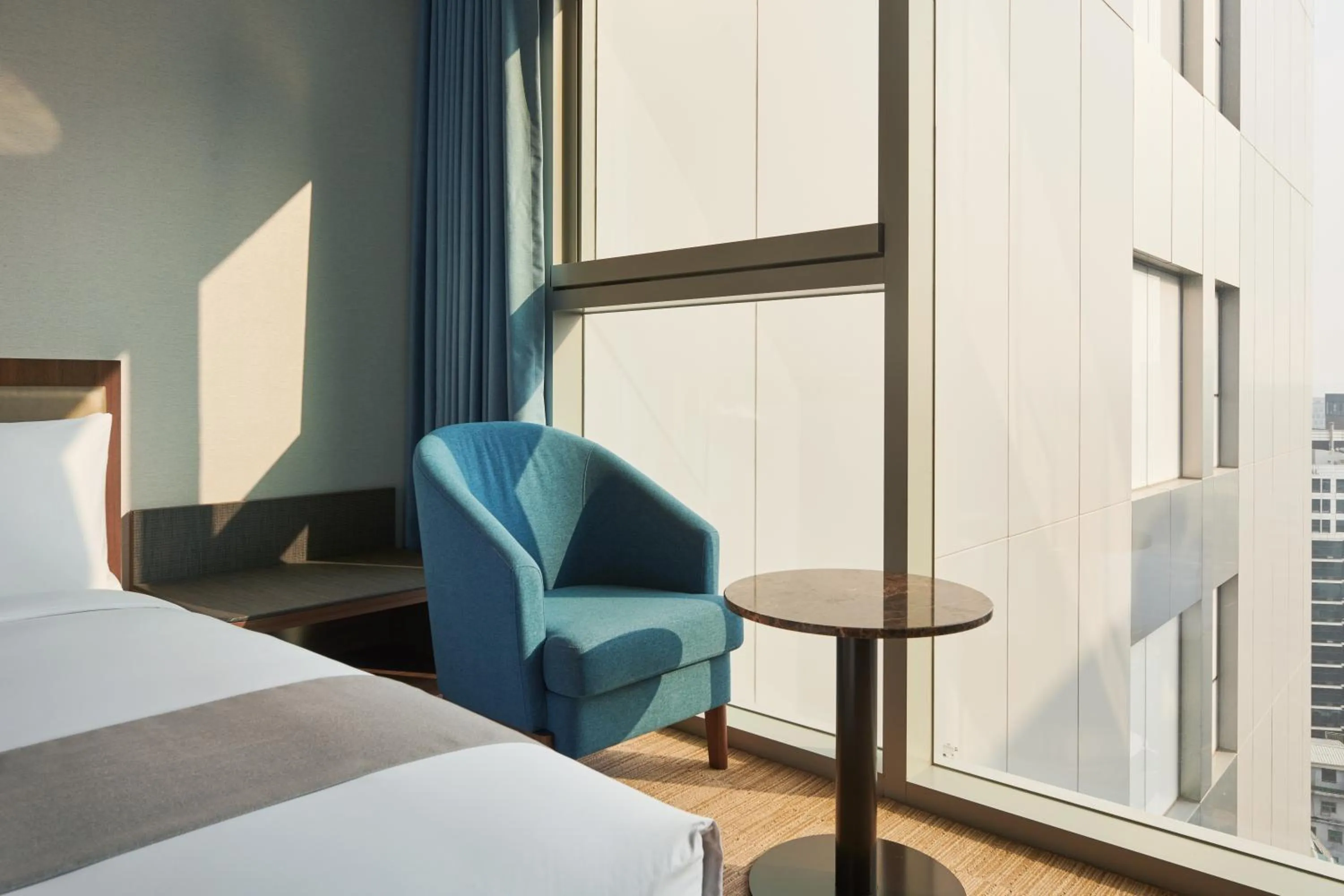 Seating area, Bed in Stanford Hotel Myeongdong