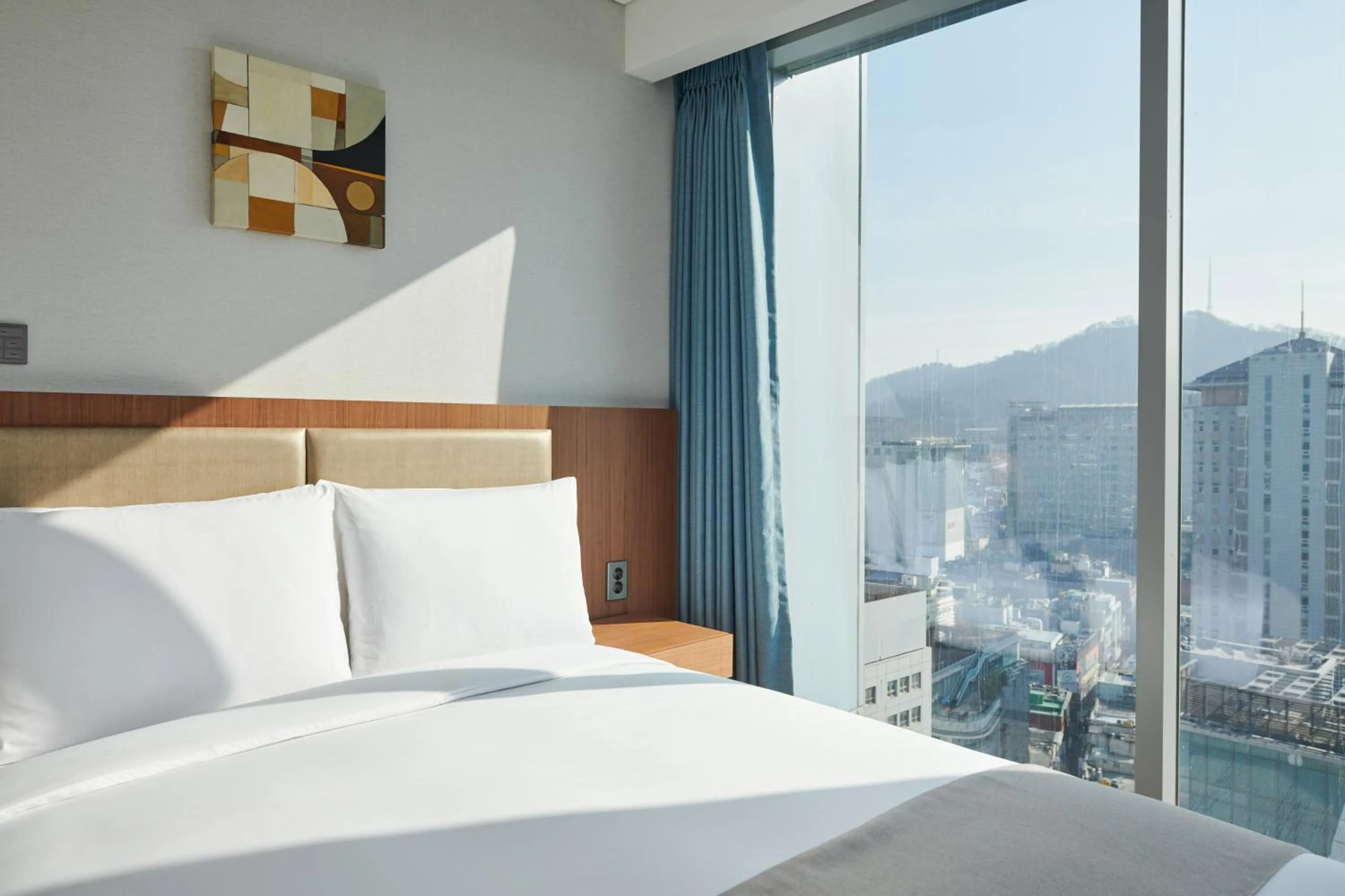 Bed in Stanford Hotel Myeongdong