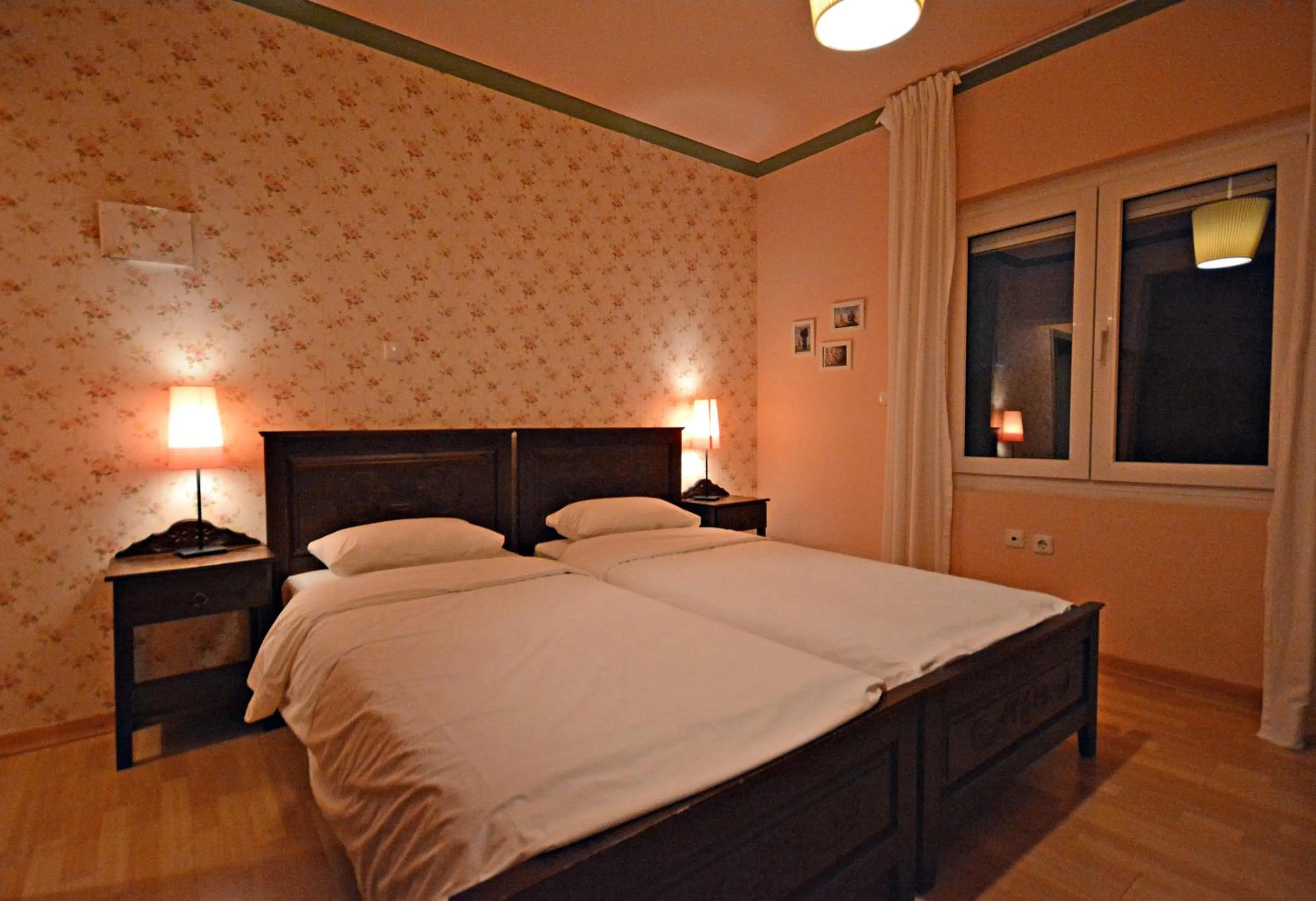 Photo of the whole room, Bed in Guesthouse Vissinokipos - Biker Friendly - Motorradhotel