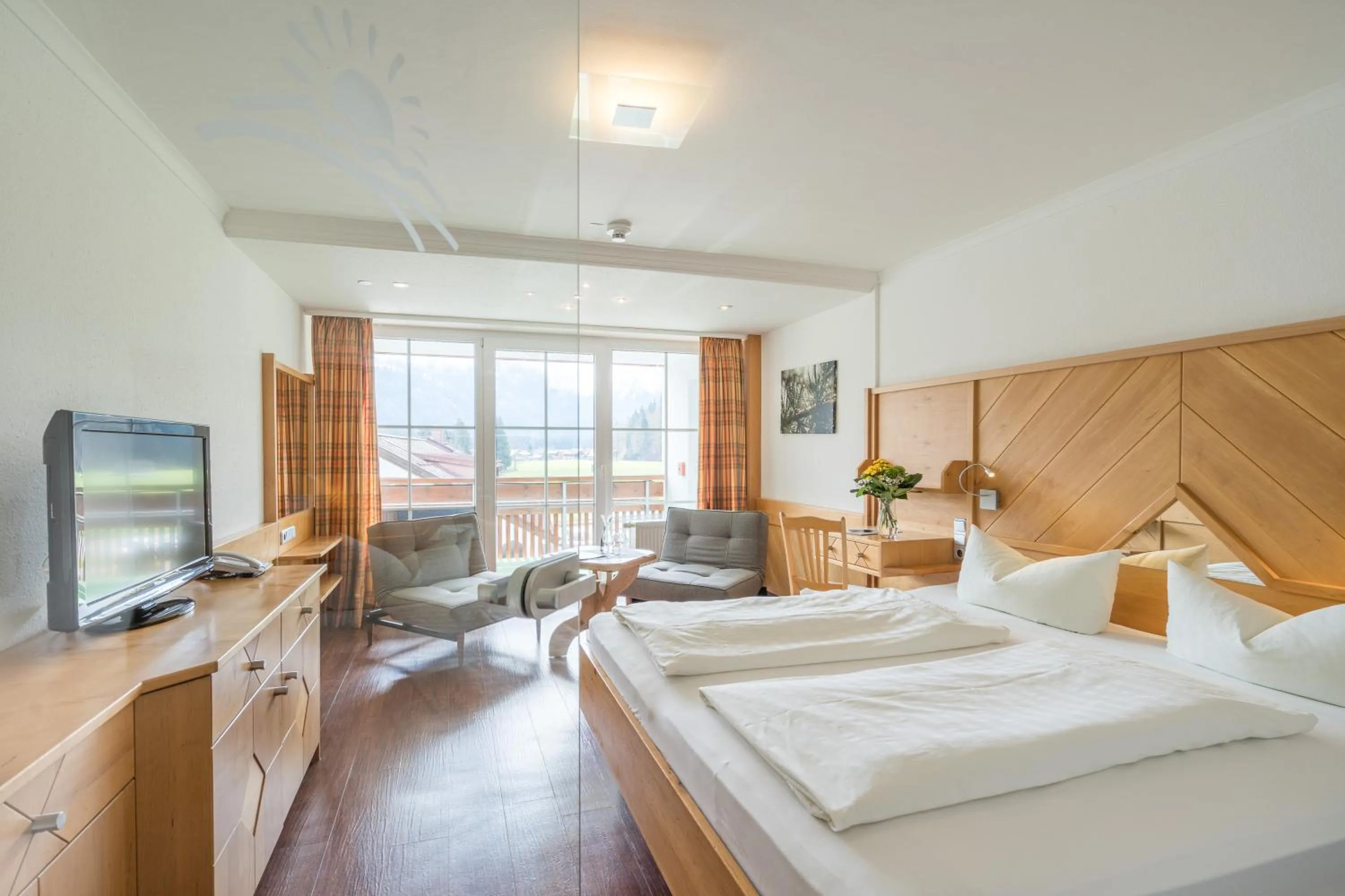 Photo of the whole room, Bed in Wohlfühlhotel Frohsinn