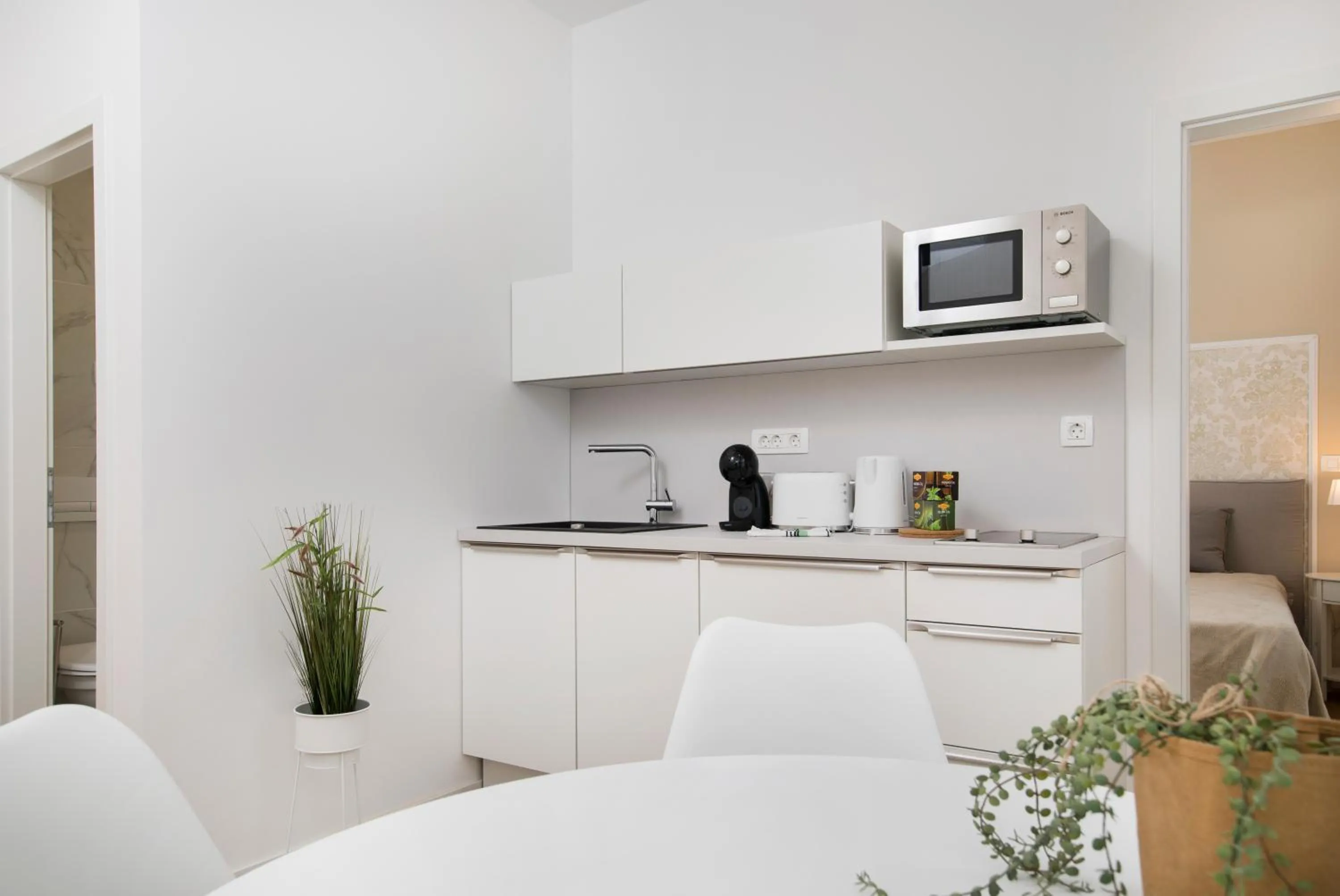 Kitchen or kitchenette in Cozy apartments