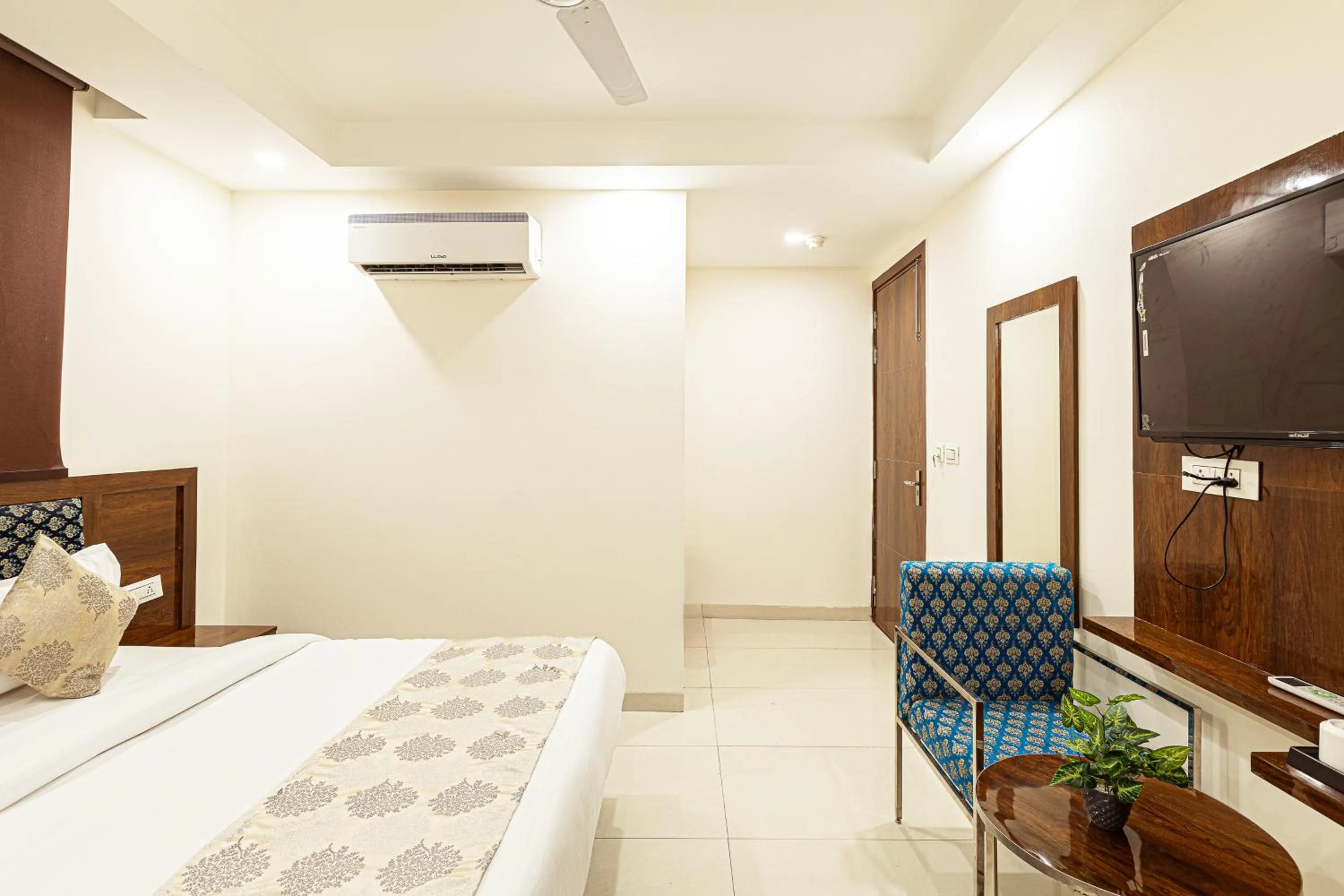 Bed in Hotel Emblem Suites- Near Delhi Airport