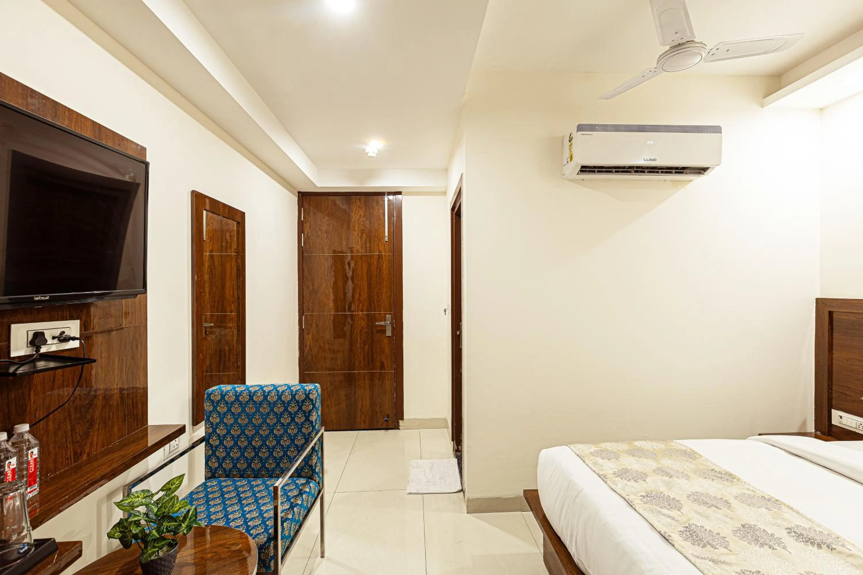 Bed in Hotel Emblem Suites- Near Delhi Airport