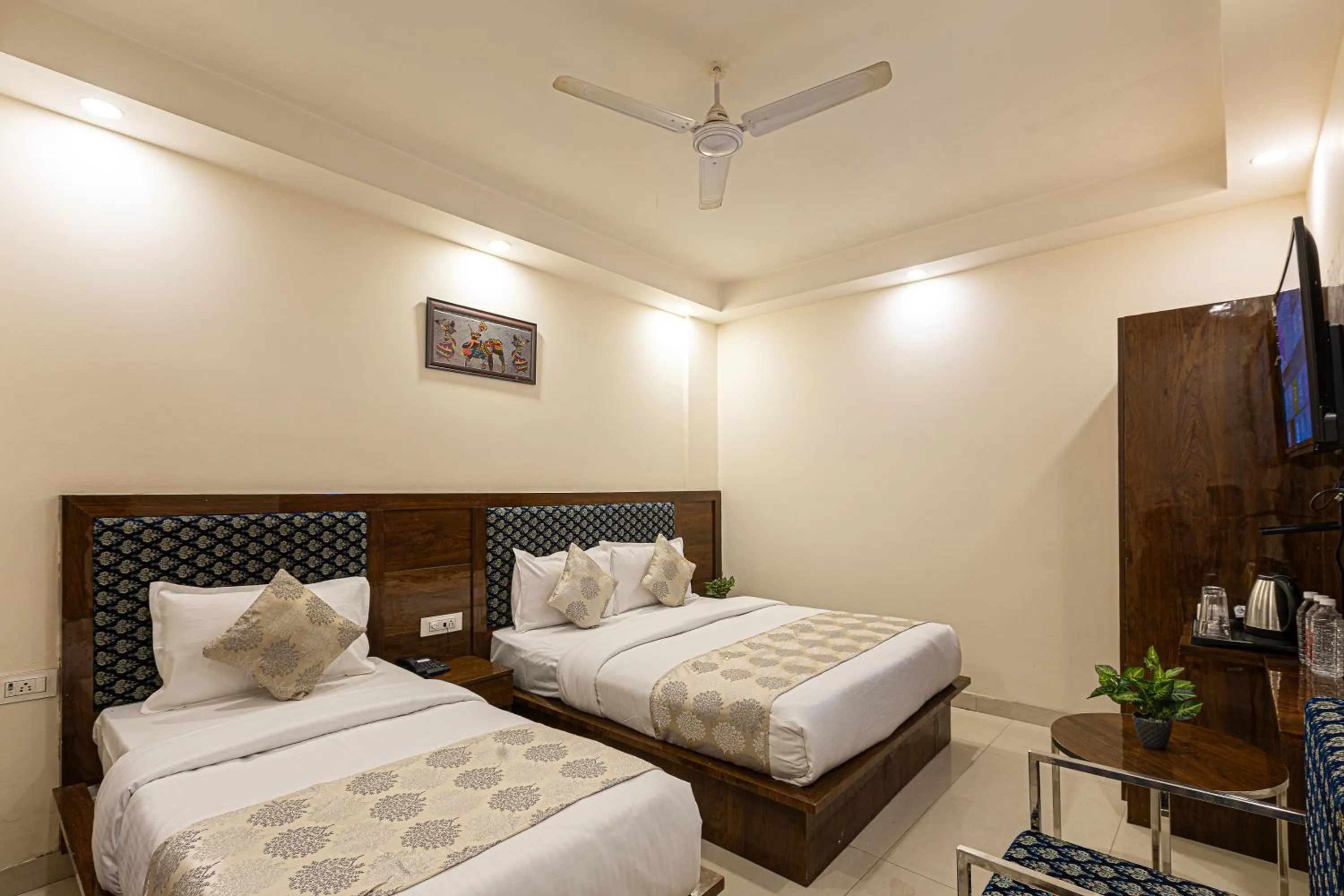 Bed in Hotel Emblem Suites- Near Delhi Airport