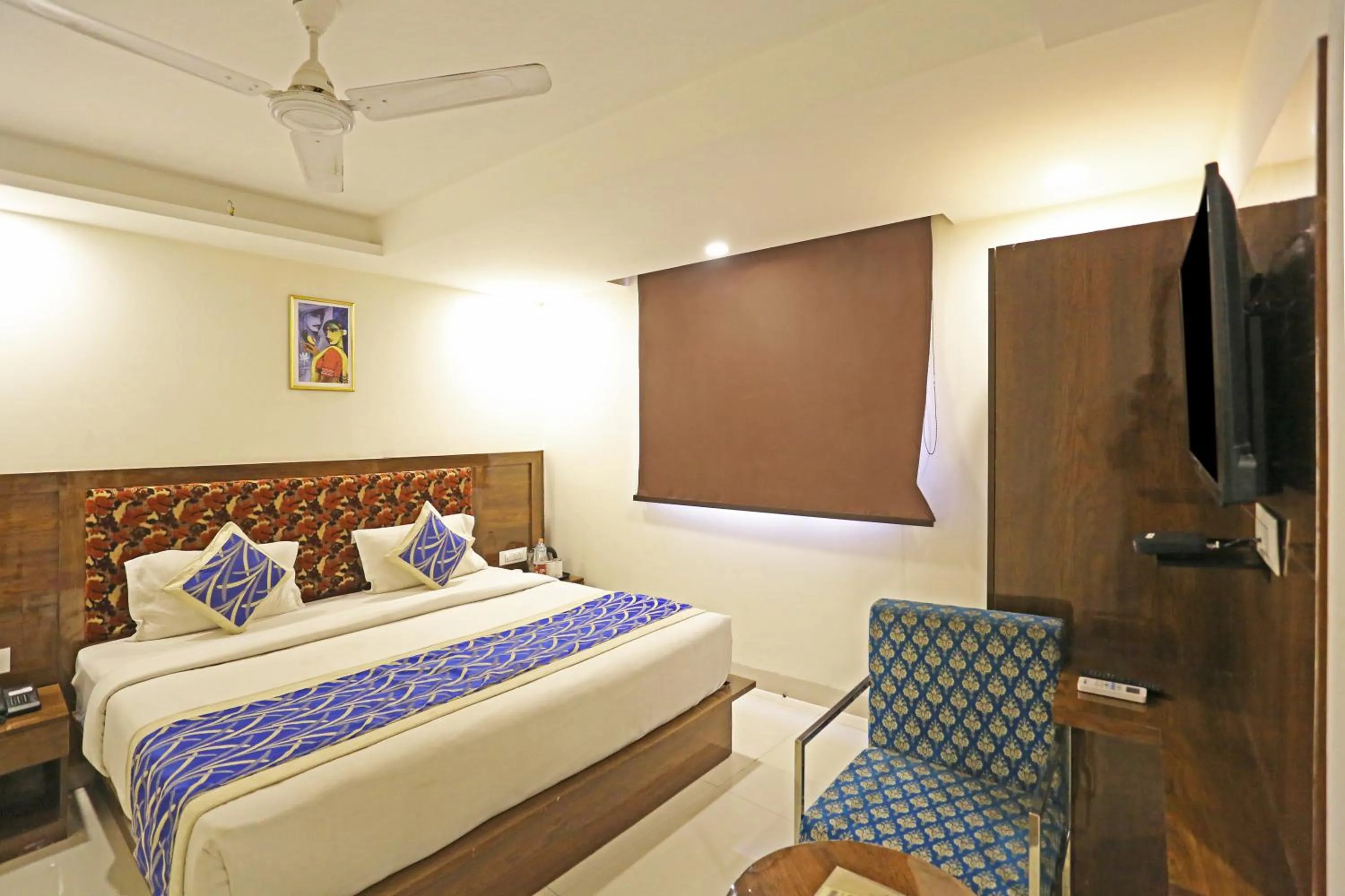Bed in Hotel Emblem Suites- Near Delhi Airport