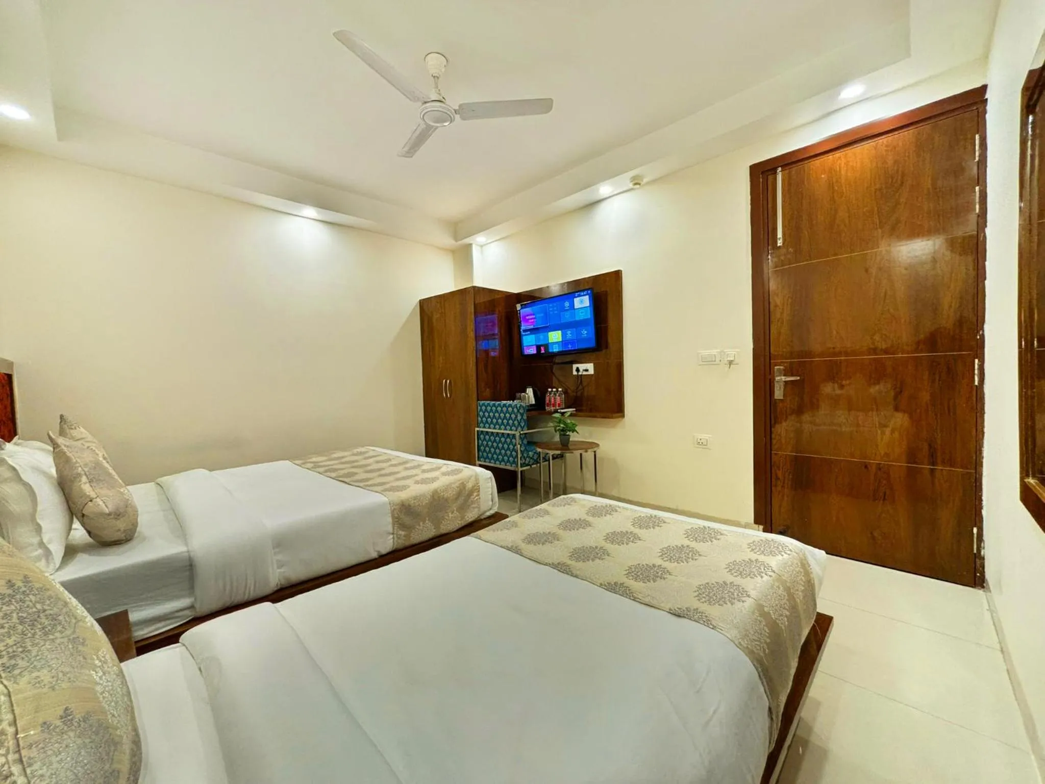 Bed in Hotel Emblem Suites- Near Delhi Airport