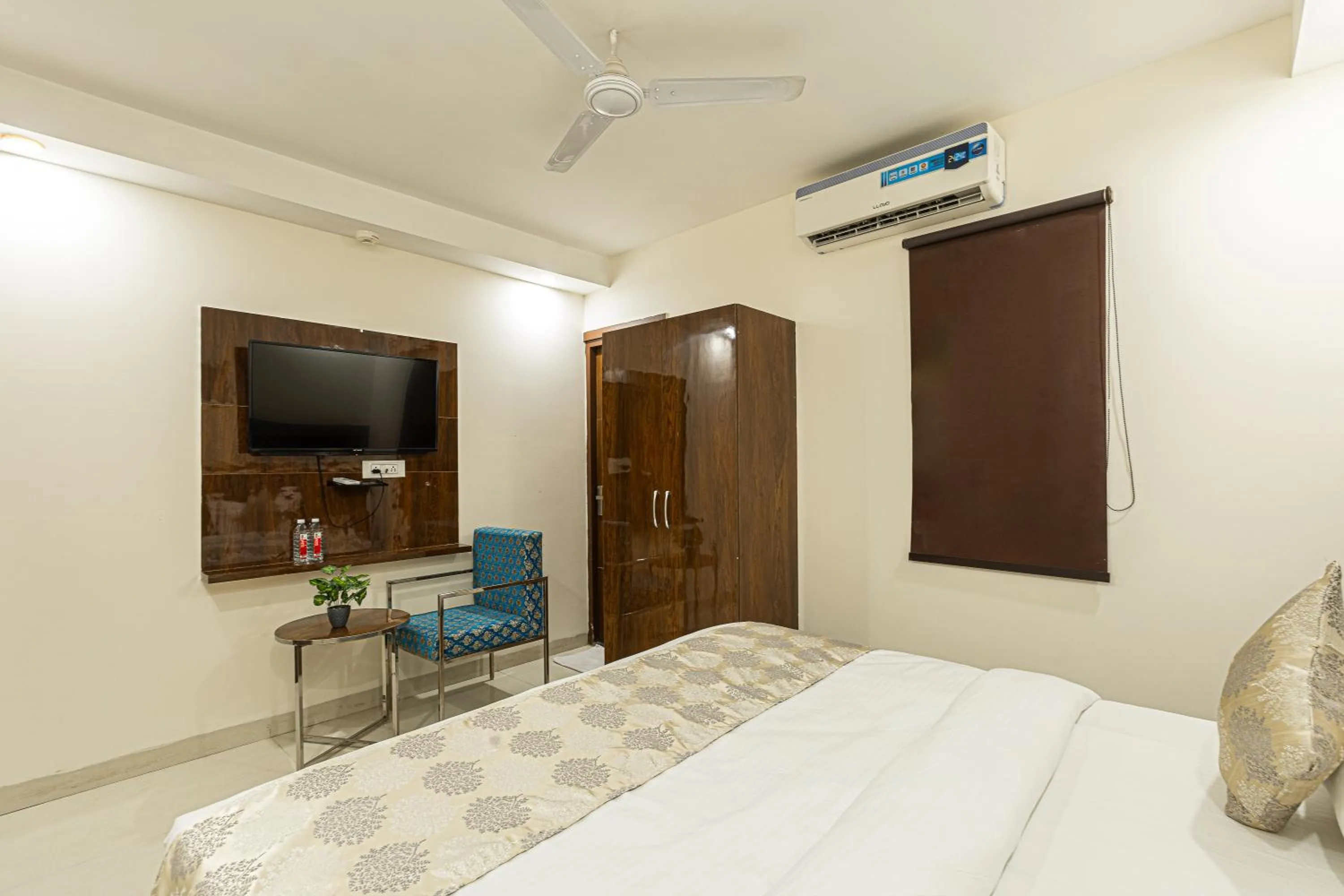 Bed in Hotel Emblem Suites- Near Delhi Airport