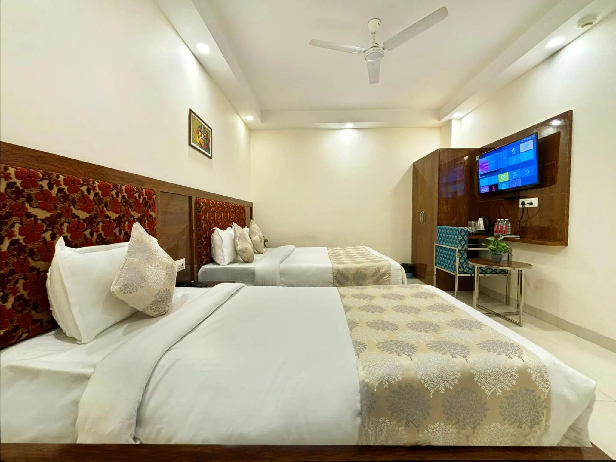 Bed in Hotel Emblem Suites- Near Delhi Airport