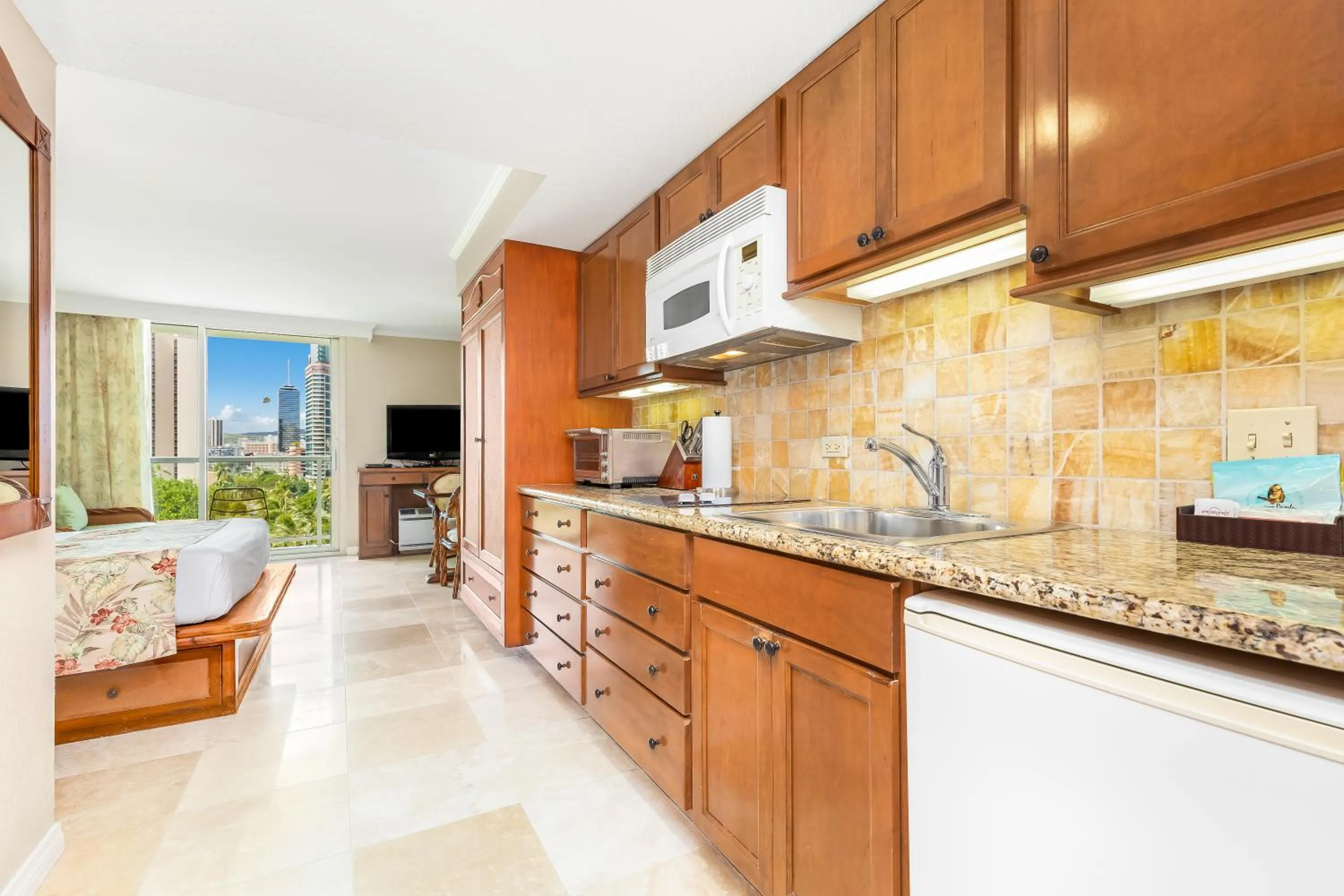 Kitchen or kitchenette in Luana Waikiki Hotel & Suites