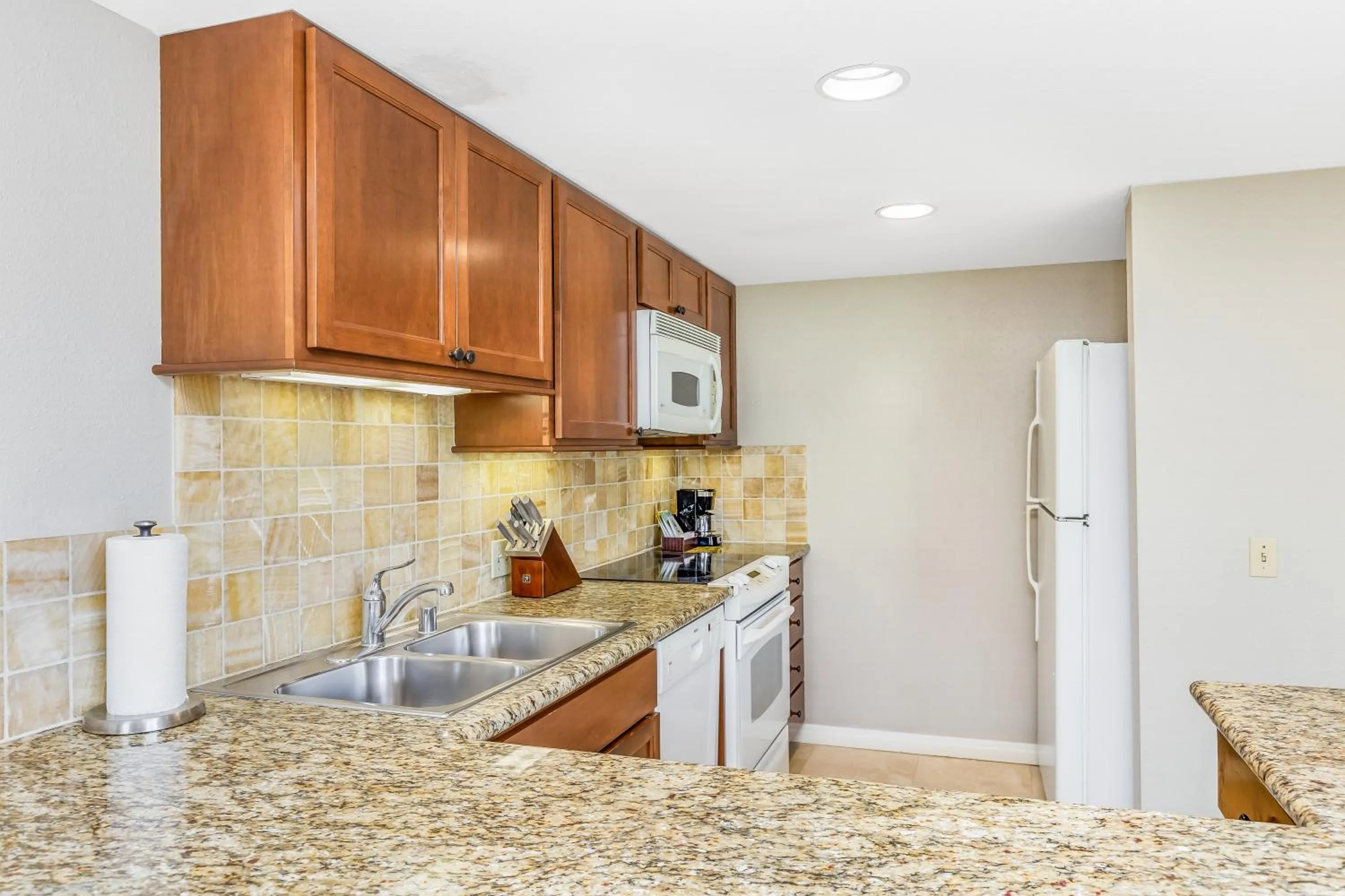 Kitchen or kitchenette in Luana Waikiki Hotel & Suites