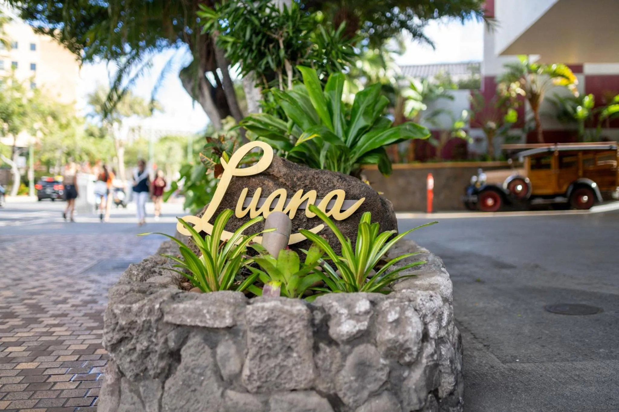 Property logo or sign in Luana Waikiki Hotel & Suites