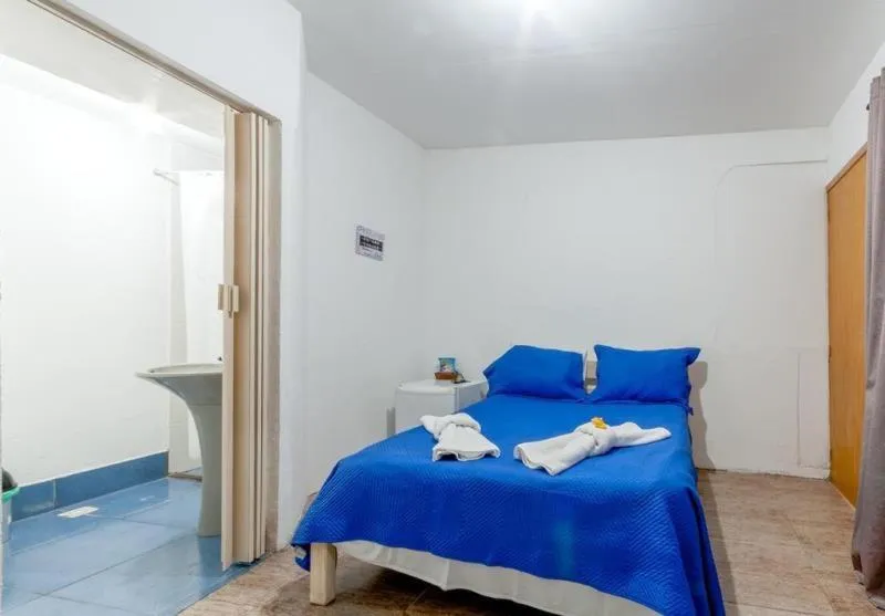 Bed in Pousada Ponta dos Corais