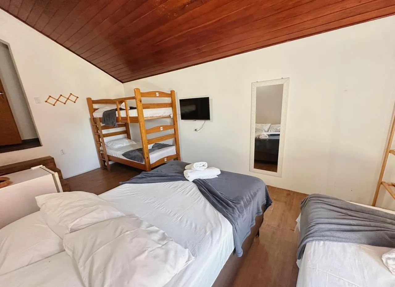 Bed in Pousada Ponta dos Corais