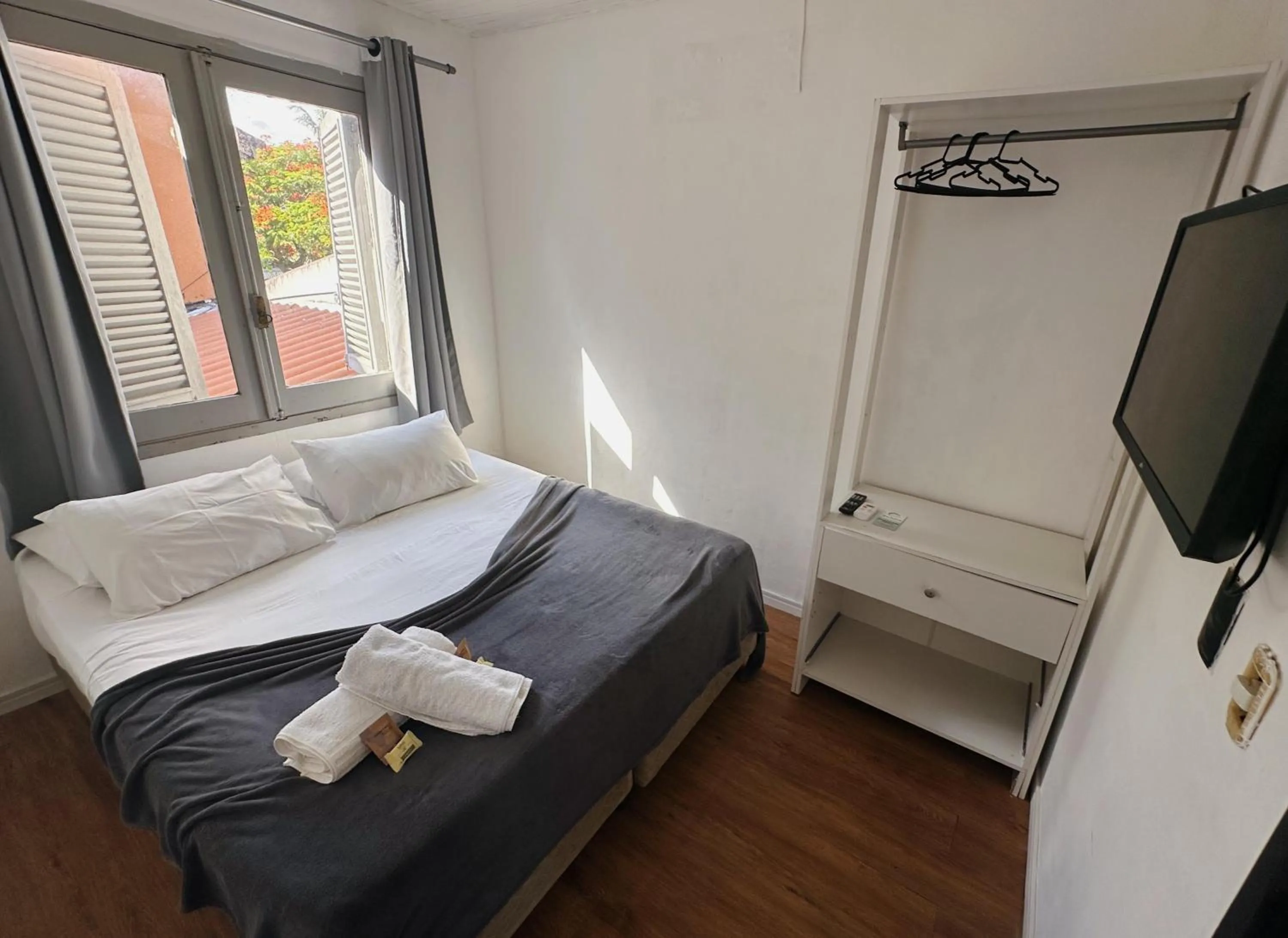 Bed in Pousada Ponta dos Corais