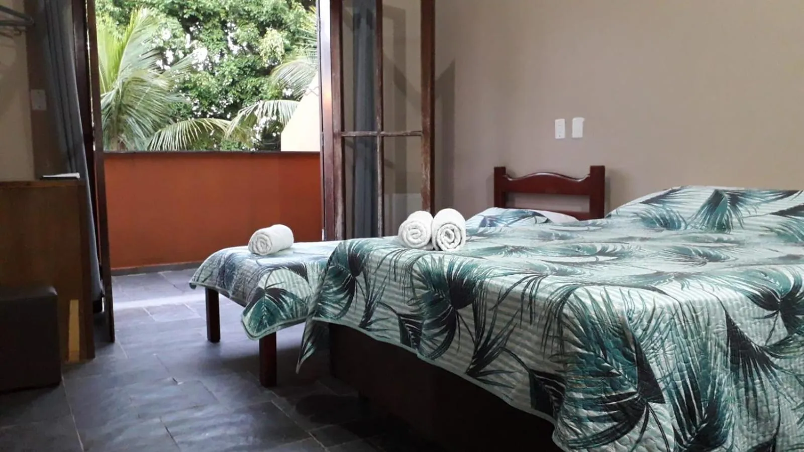 Bed in Pousada Ponta dos Corais