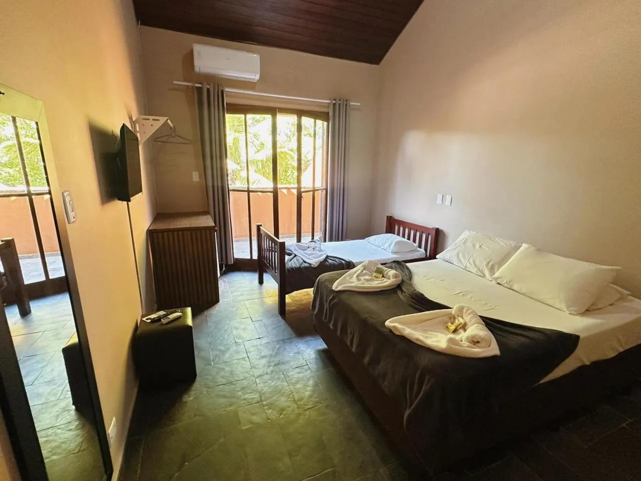 Bed in Pousada Ponta dos Corais