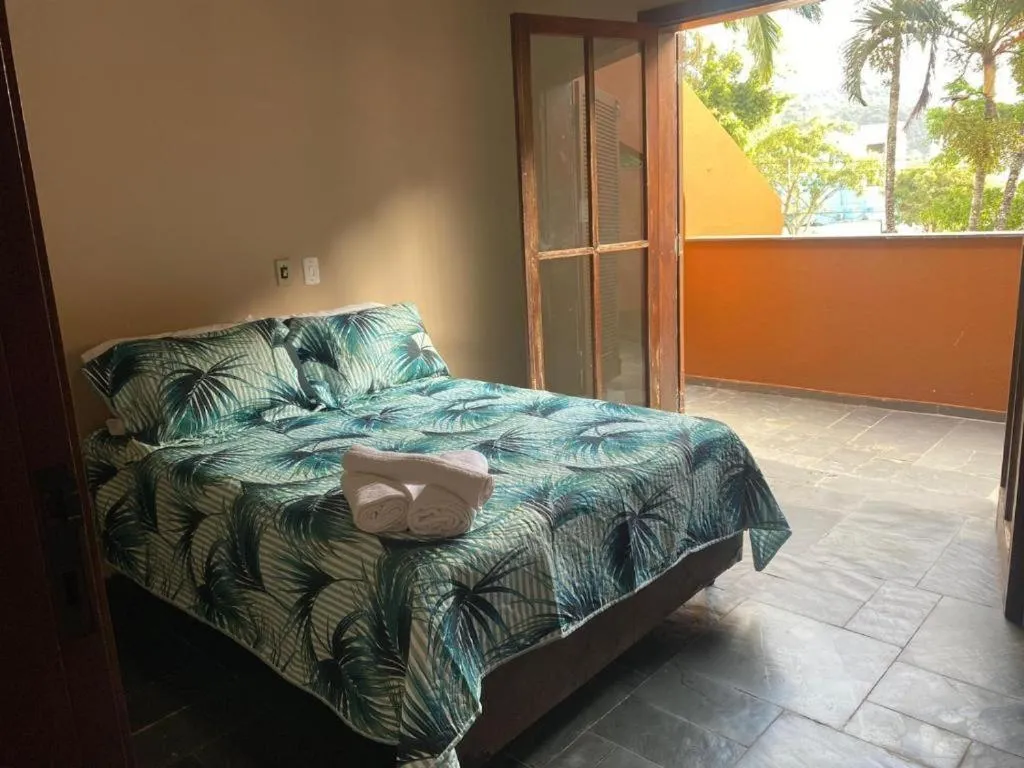 Bed in Pousada Ponta dos Corais