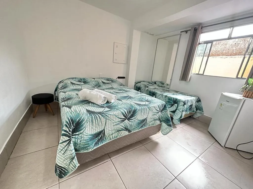 Bed in Pousada Ponta dos Corais