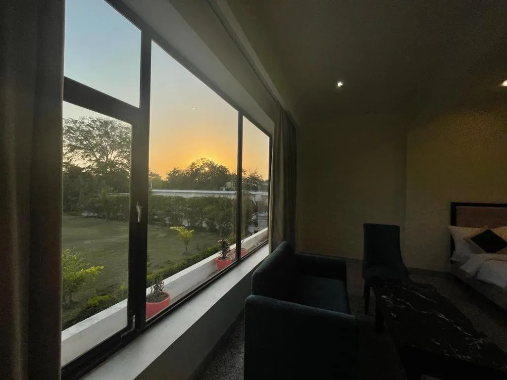 Bed in Gautam Hotels & Resorts