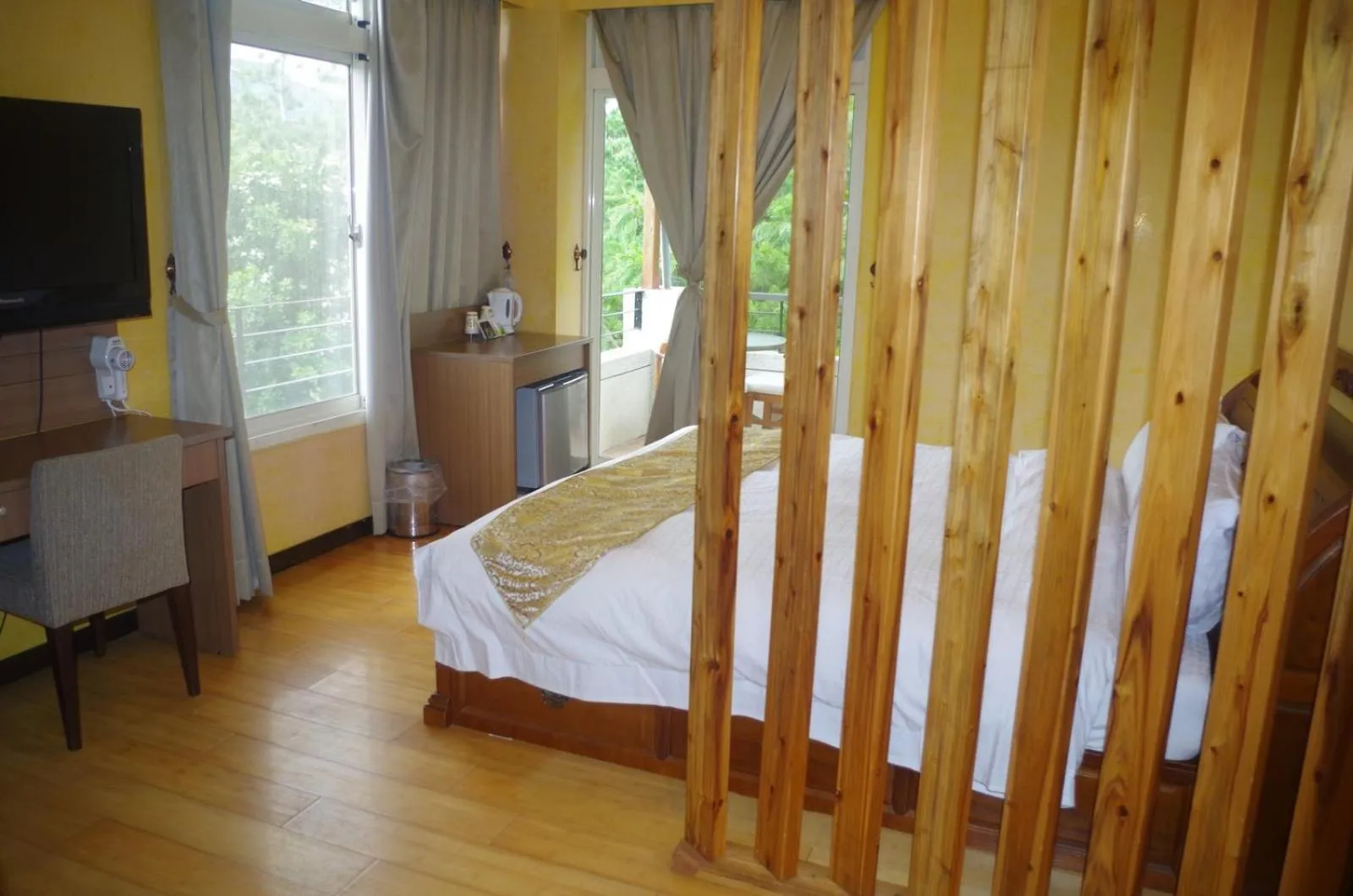 Bed in Zen and Pine Resort