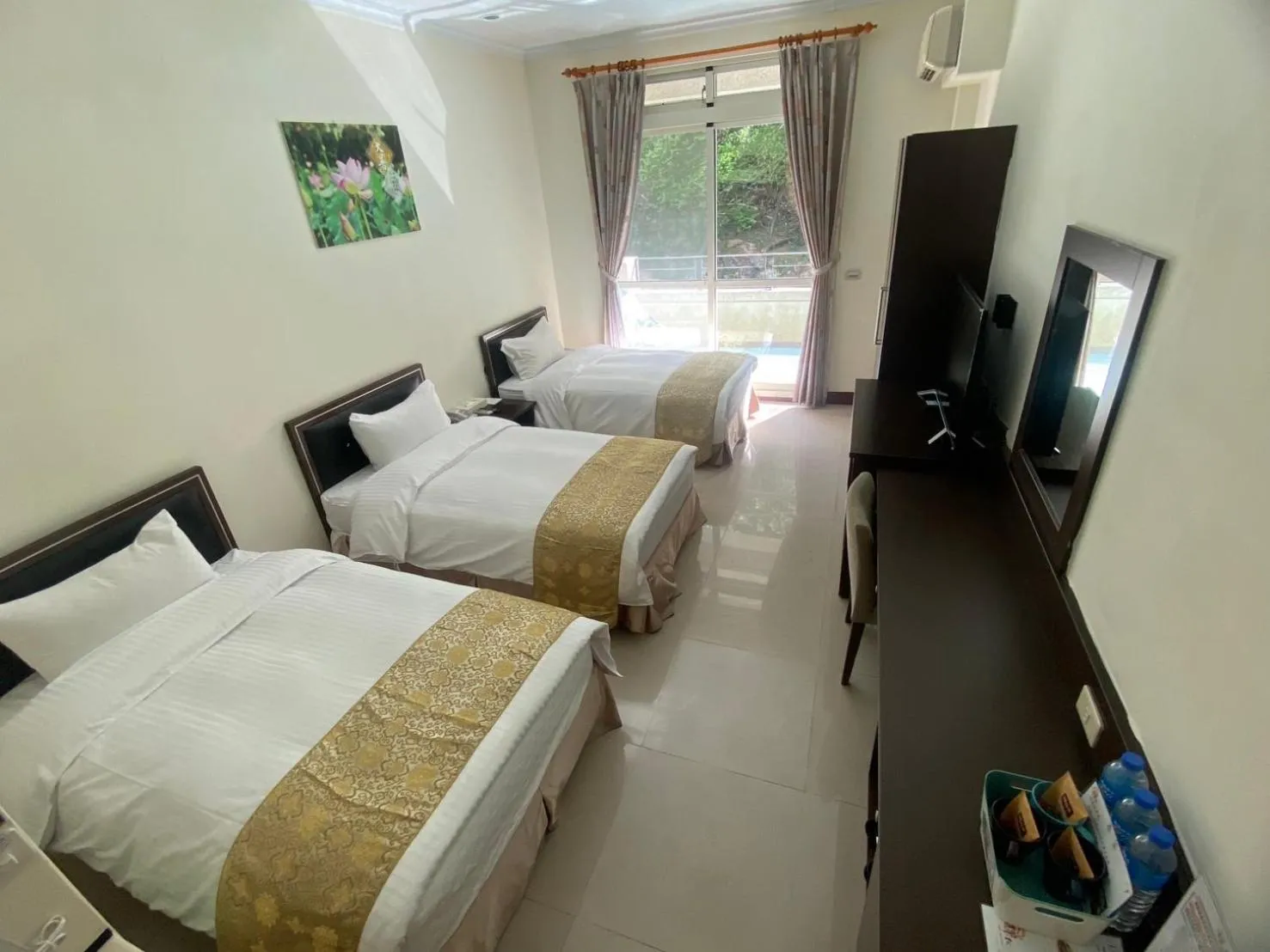 Bed in Zen and Pine Resort